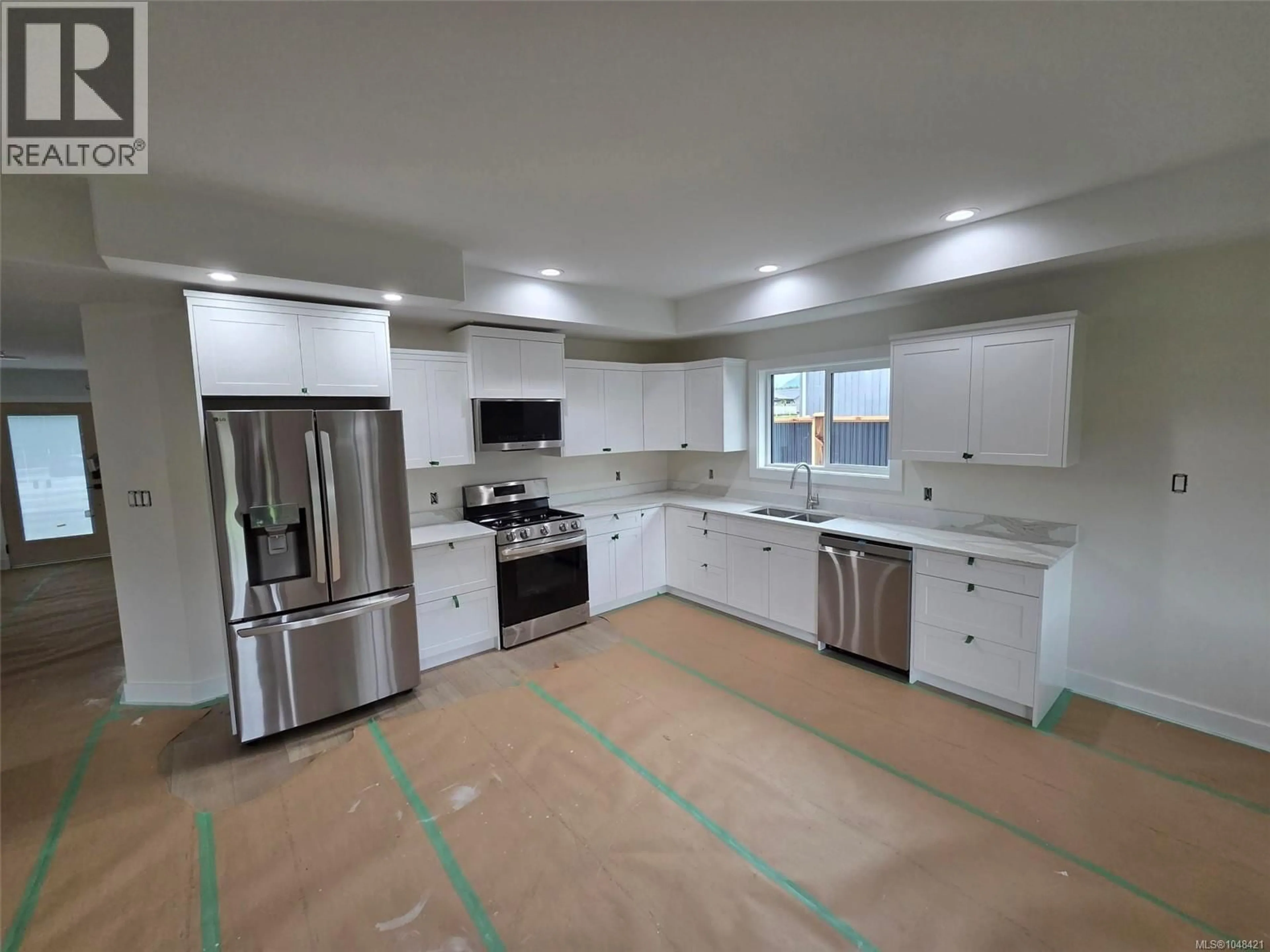 Open concept kitchen, ceramic/tile floor for 5255 TEBO AVENUE, Port Alberni British Columbia V9Y6A2