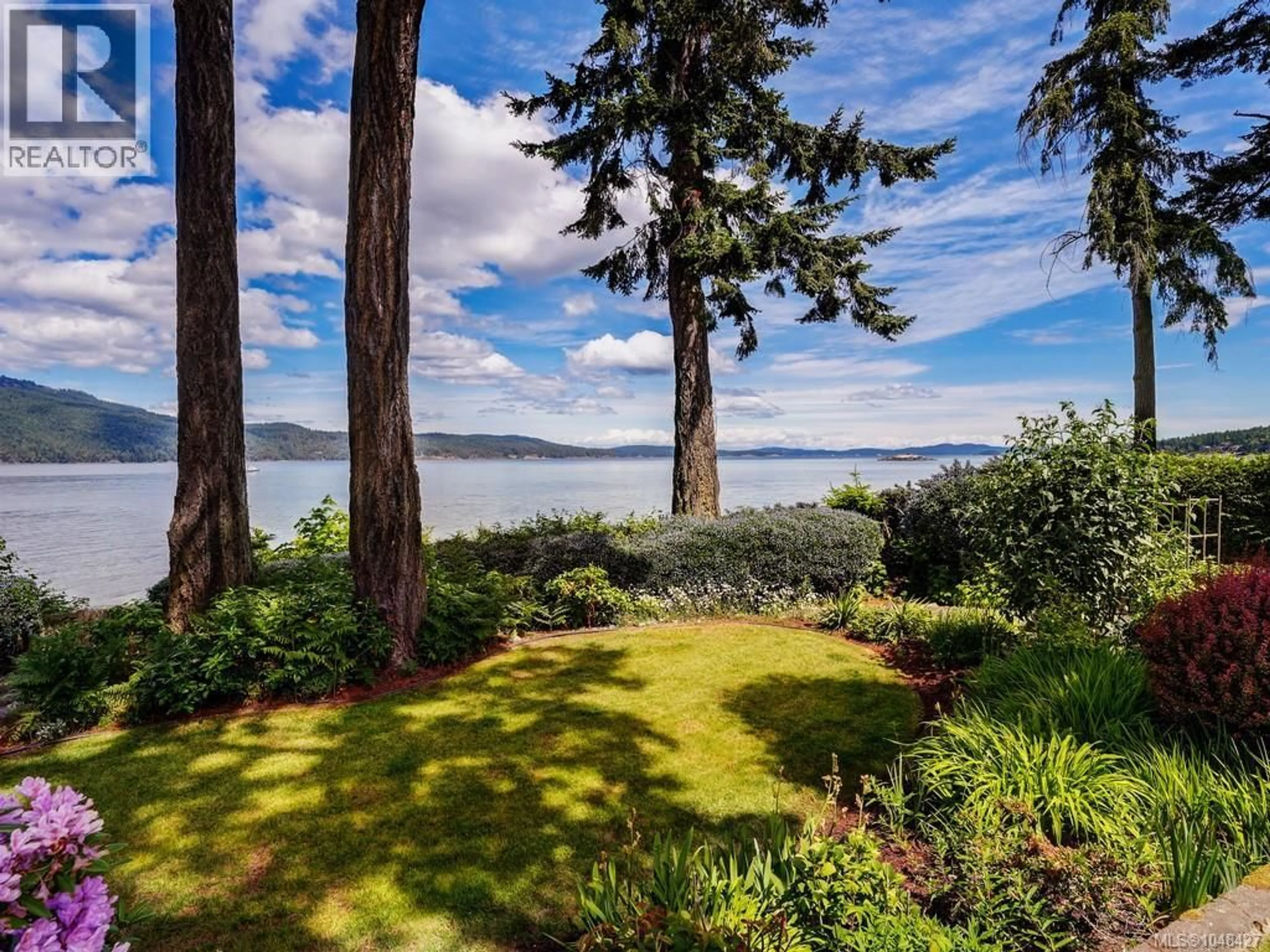 A pic from outside/outdoor area/front of a property/back of a property/a pic from drone, water/lake/river/ocean view for 11657 JUPATA WAY, North Saanich British Columbia V8L5K1