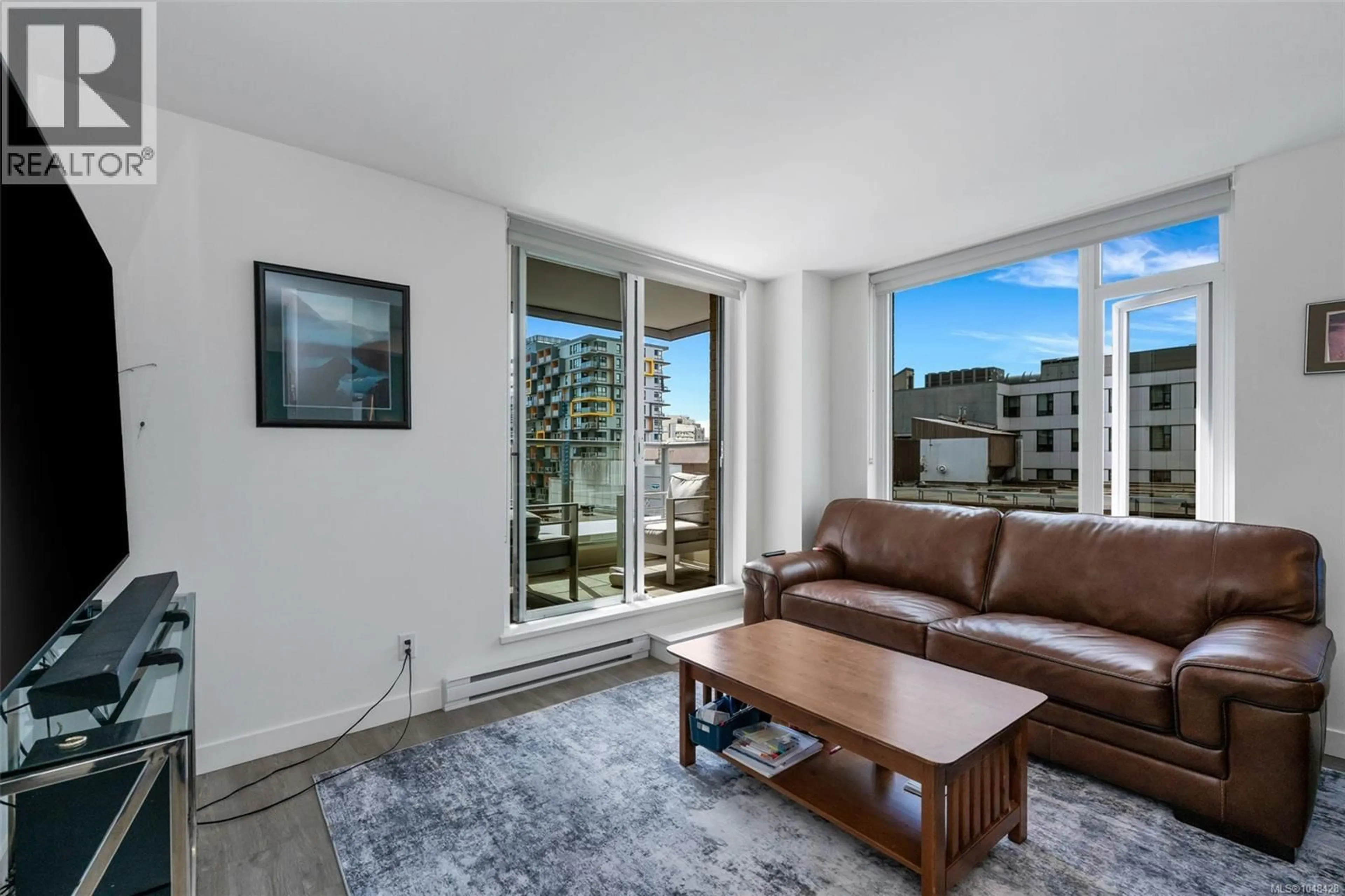 Living room with furniture, unknown for 707 - 845 JOHNSON STREET, Victoria British Columbia V8W0G3