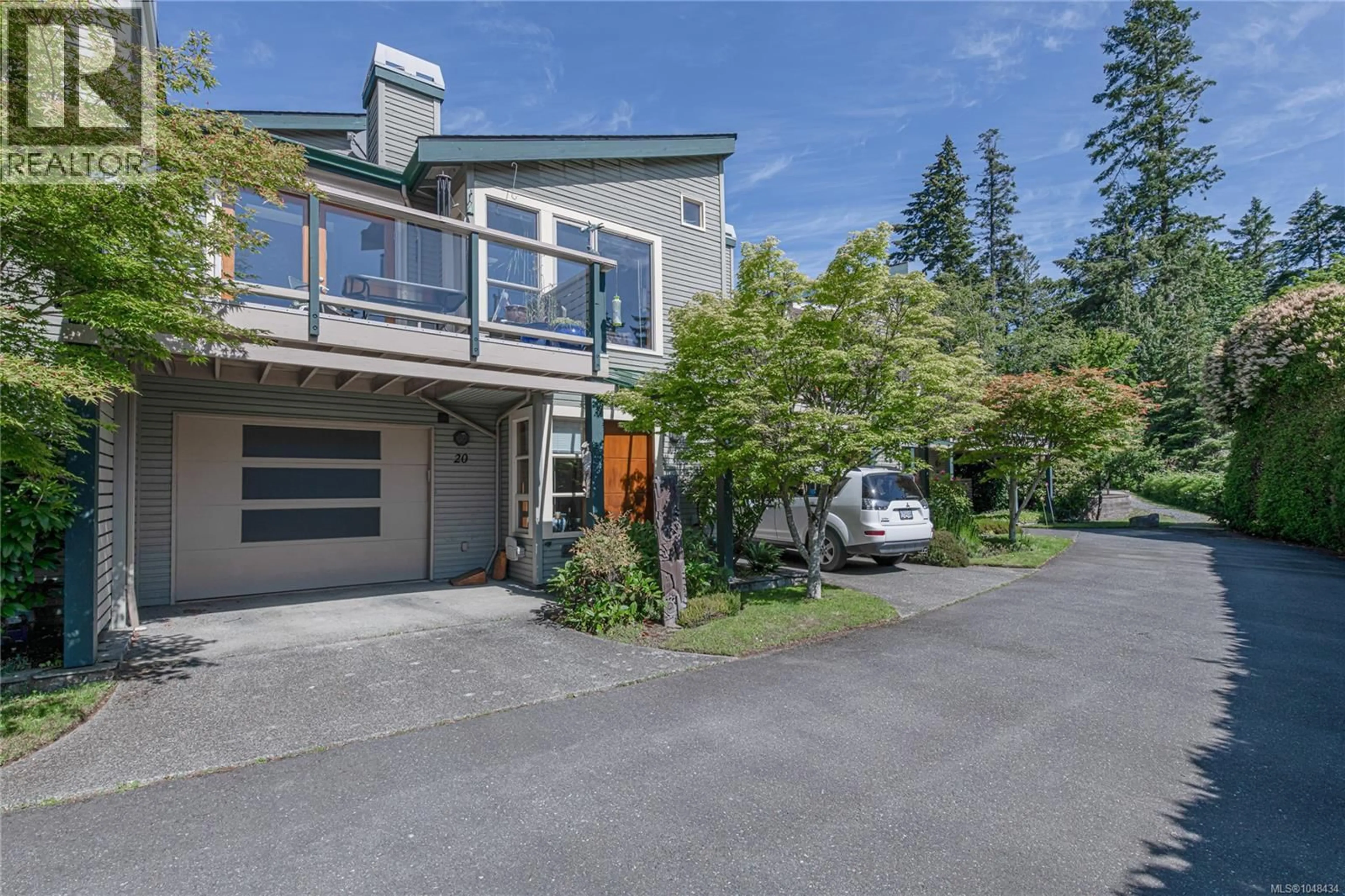 A pic from outside/outdoor area/front of a property/back of a property/a pic from drone, street for 20 - 133 CORBETT ROAD, Salt Spring British Columbia V8K2W6