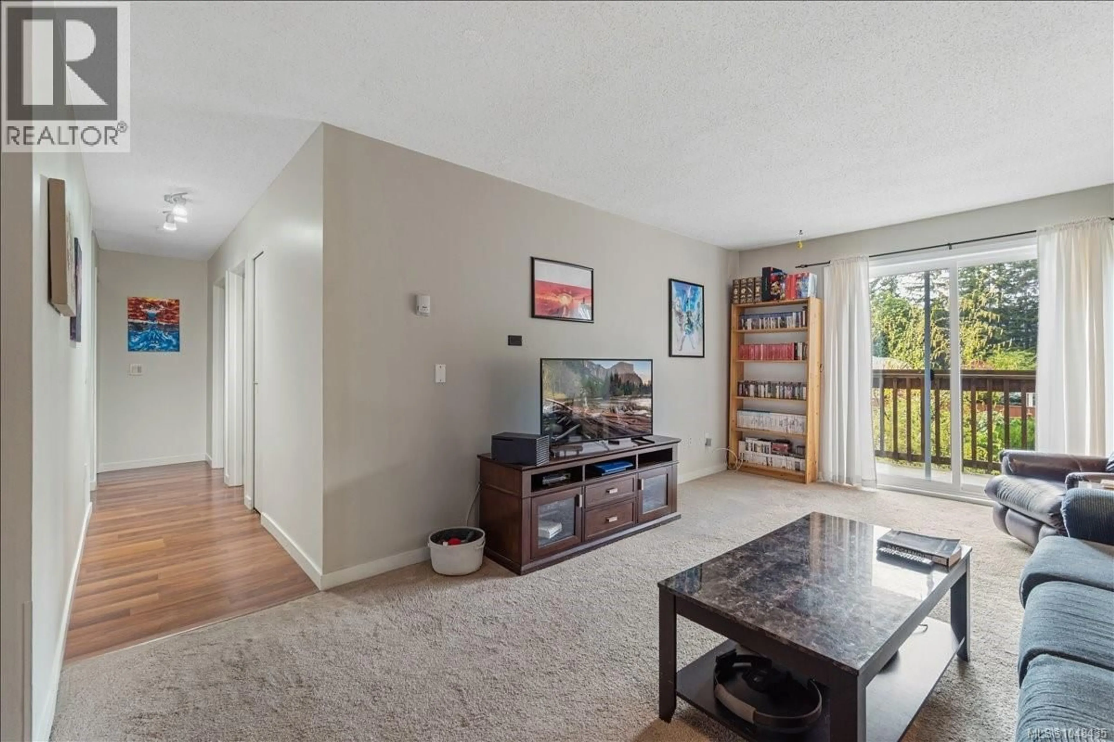 Living room with furniture, unknown for 402 - 4728 UPLANDS DRIVE, Nanaimo British Columbia V9T4S9