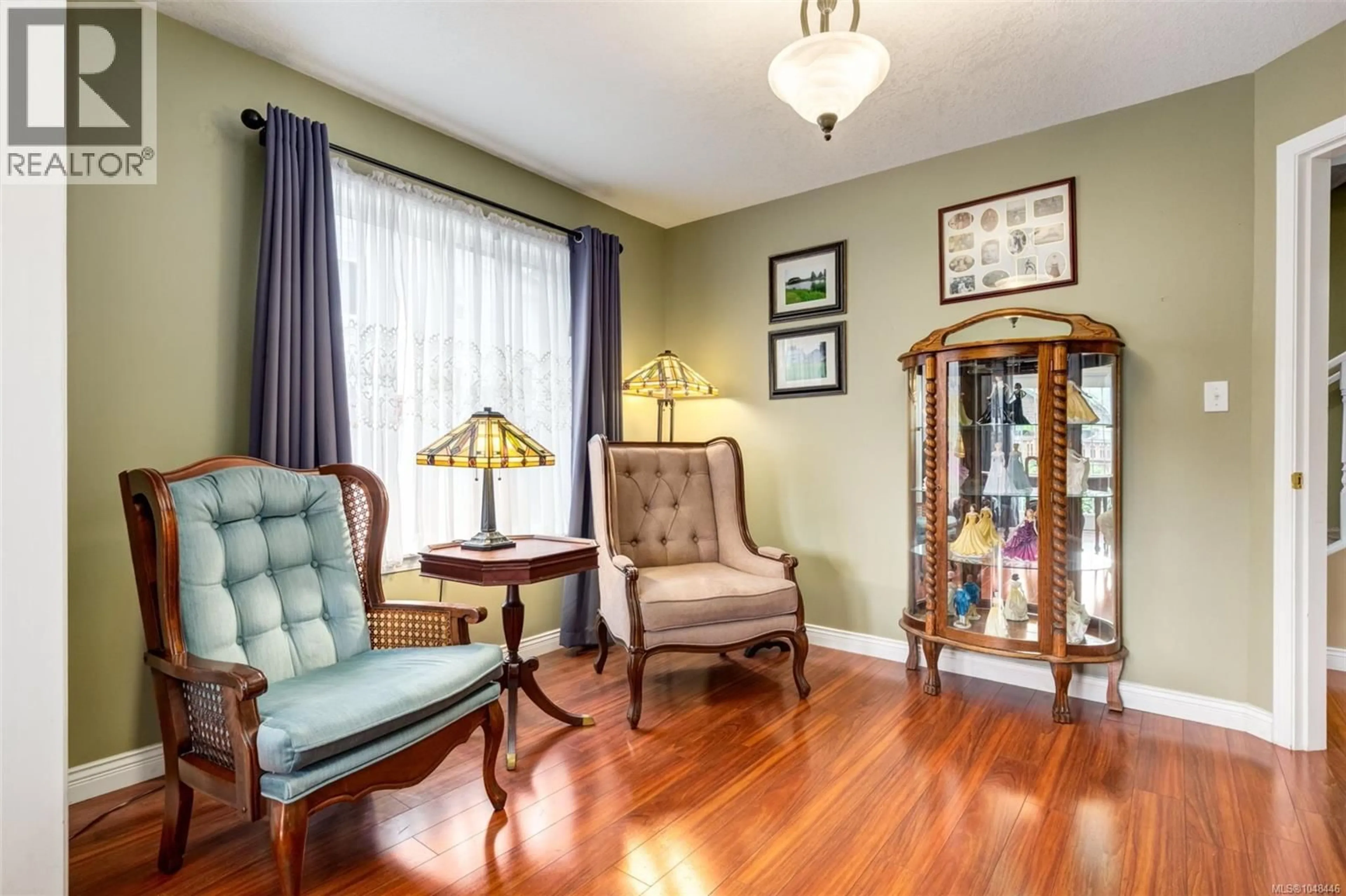 Living room with furniture, wood/laminate floor for 6119 LANE ROAD, Duncan British Columbia V9L4E2