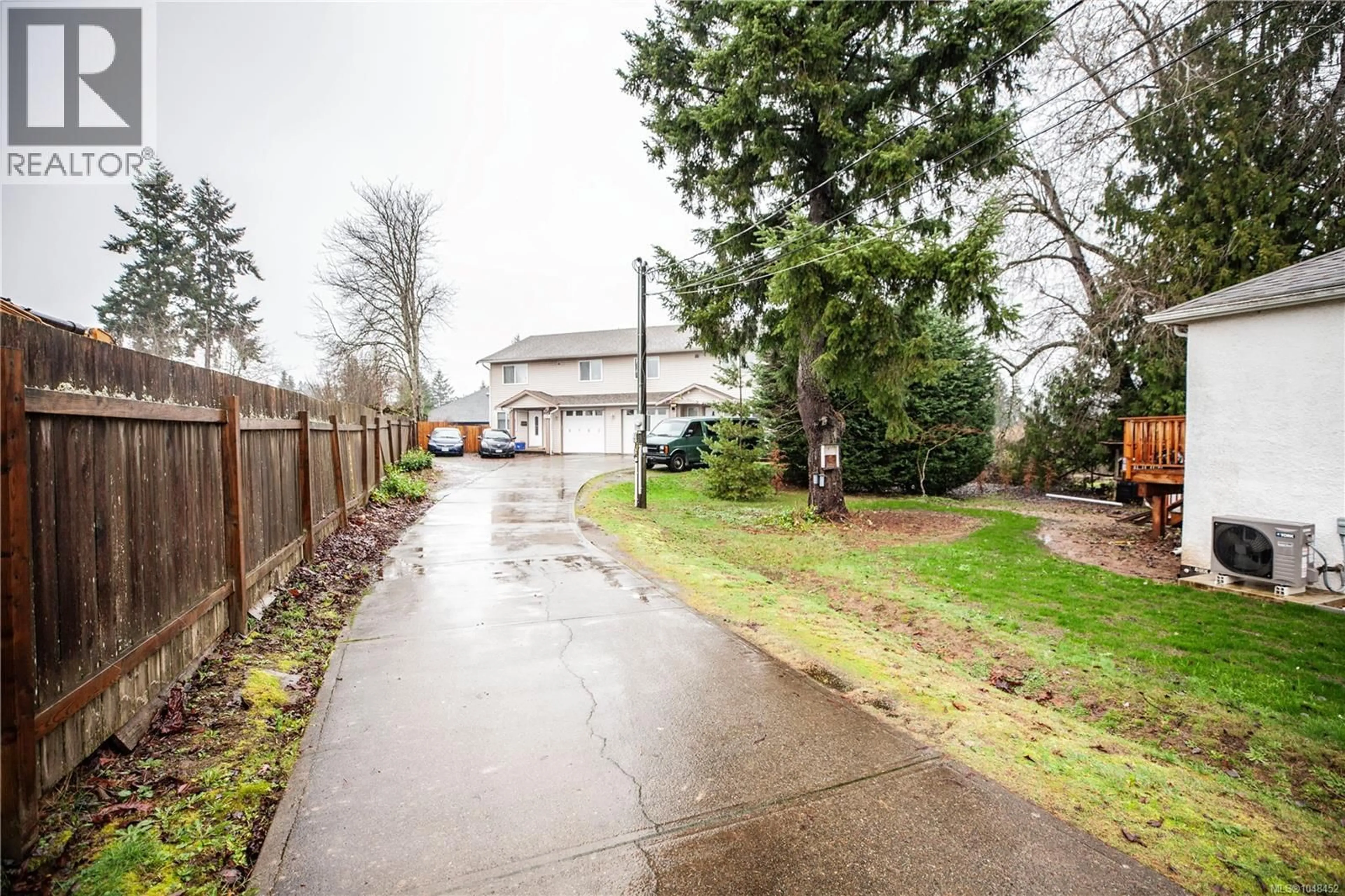 A pic from outside/outdoor area/front of a property/back of a property/a pic from drone, street for 6164 GRIEVE ROAD, Duncan British Columbia V9L2H1