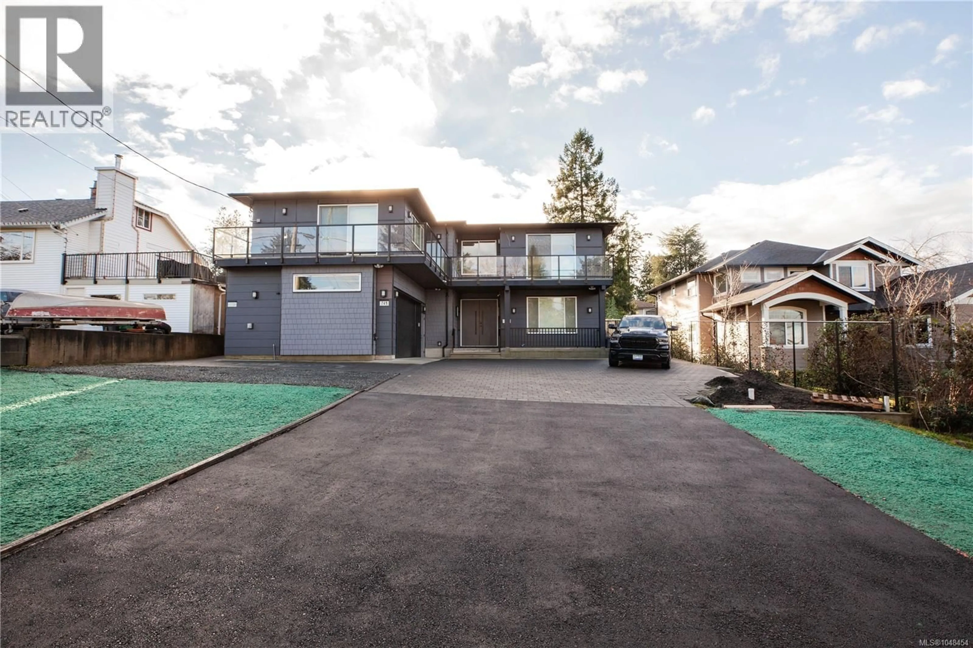 A pic from outside/outdoor area/front of a property/back of a property/a pic from drone, street for 741 SNOWDROP AVENUE, Saanich British Columbia V8Z2N3