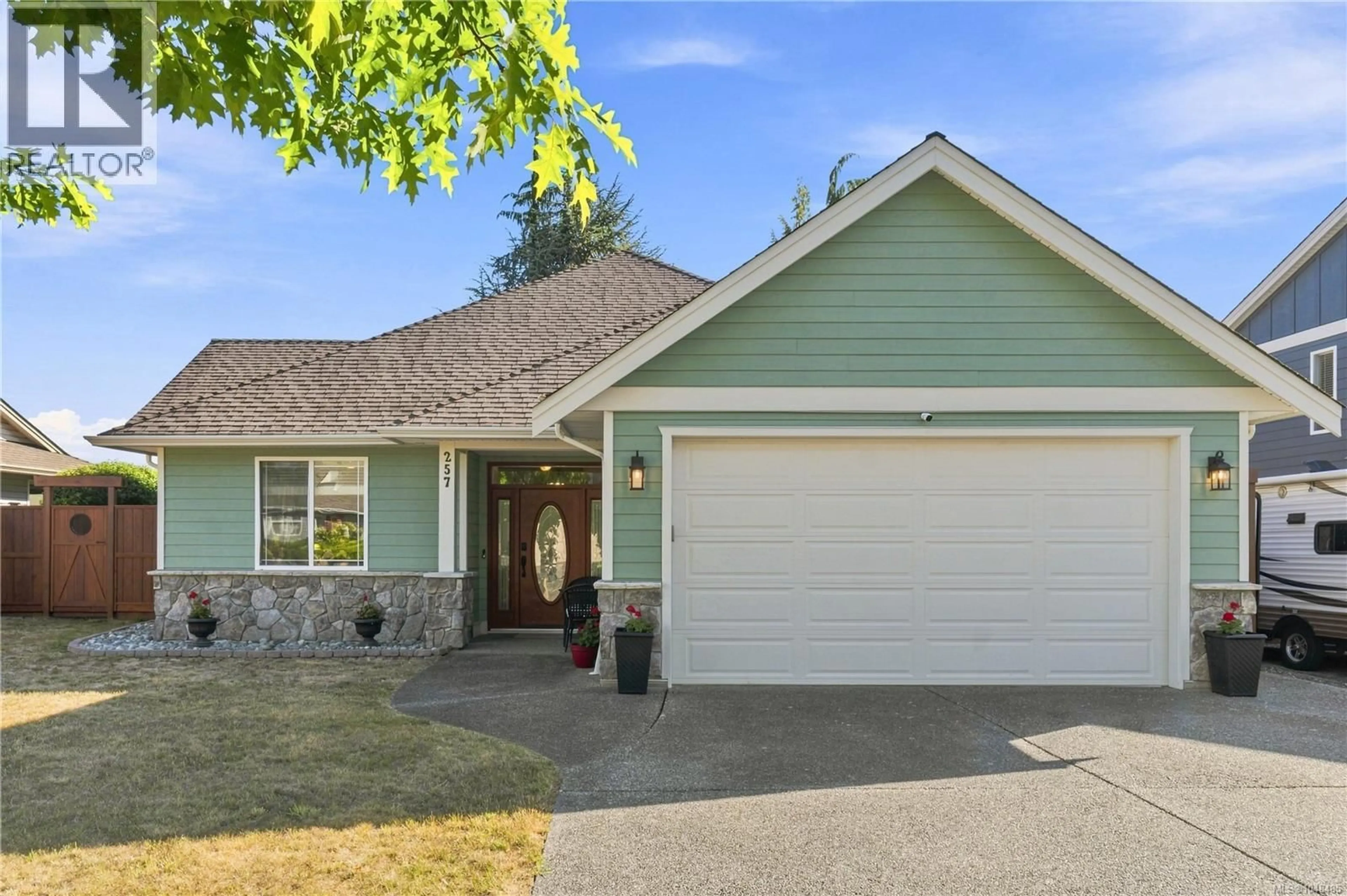 Home with vinyl exterior material, street for 257 LODGEPOLE DRIVE, Parksville British Columbia V9P2Z6