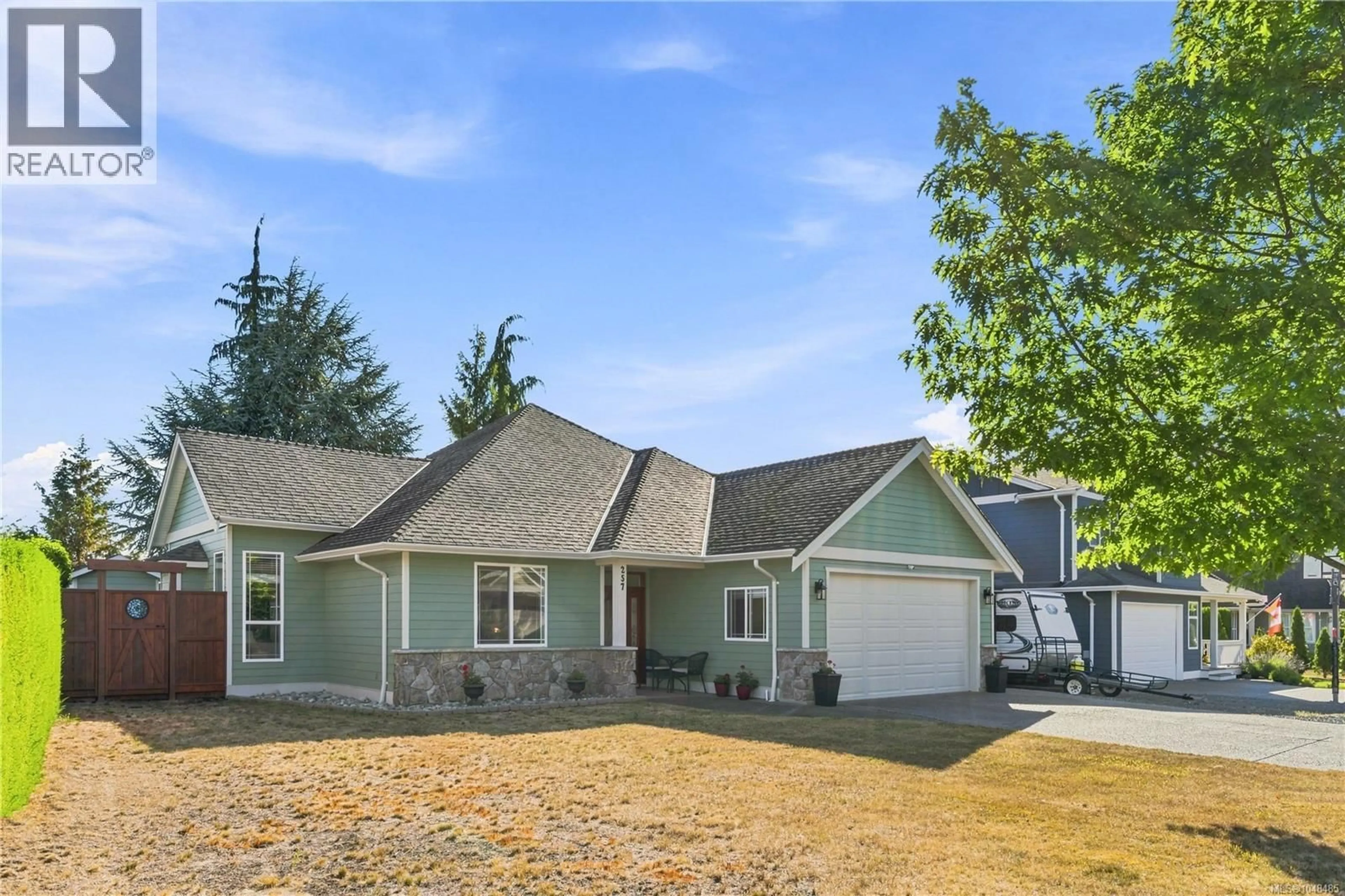 Home with vinyl exterior material, street for 257 LODGEPOLE DRIVE, Parksville British Columbia V9P2Z6