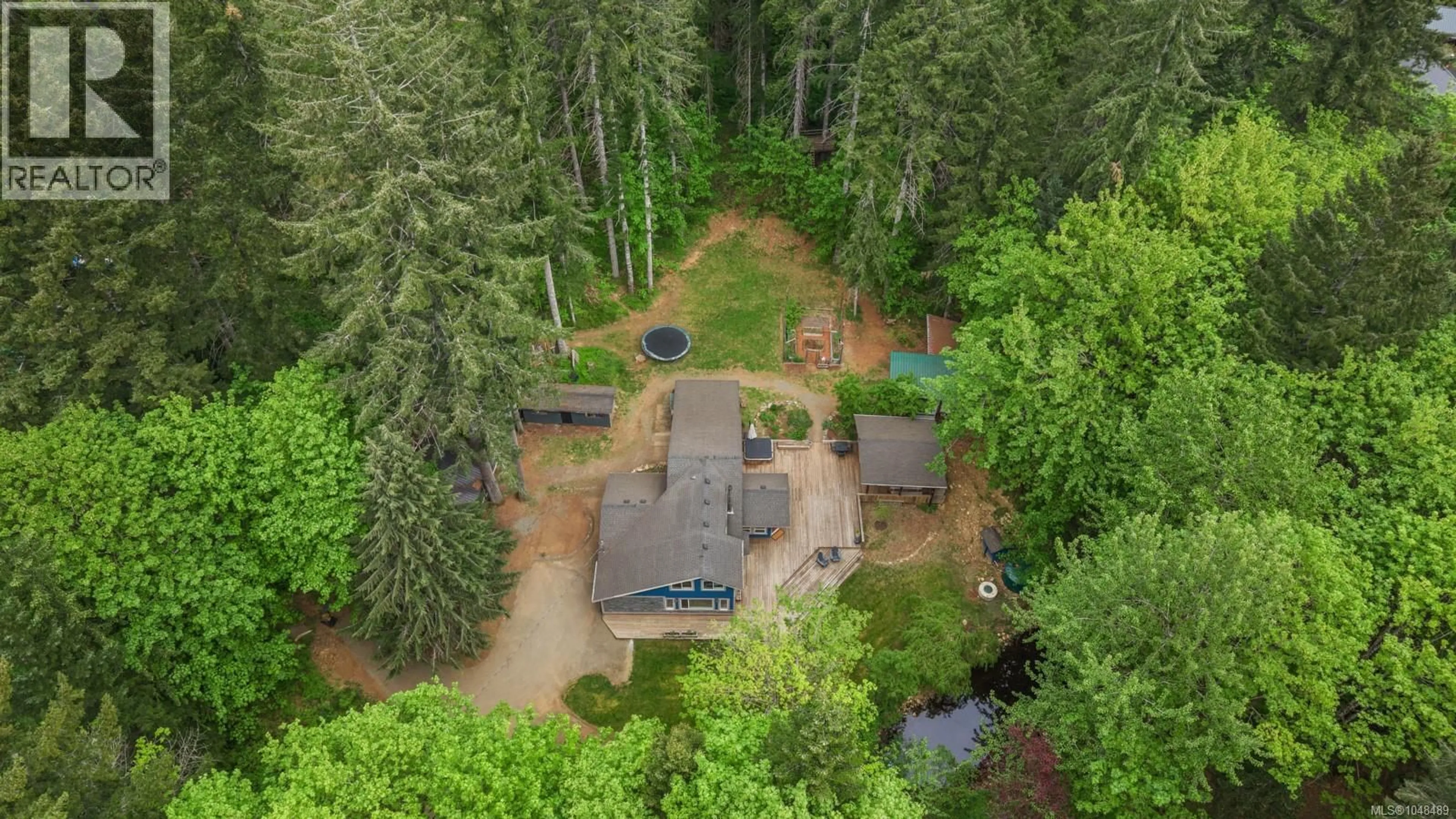 A pic from outside/outdoor area/front of a property/back of a property/a pic from drone, forest/trees view for 9525 DOYLE ROAD, Black Creek British Columbia V9J1E7