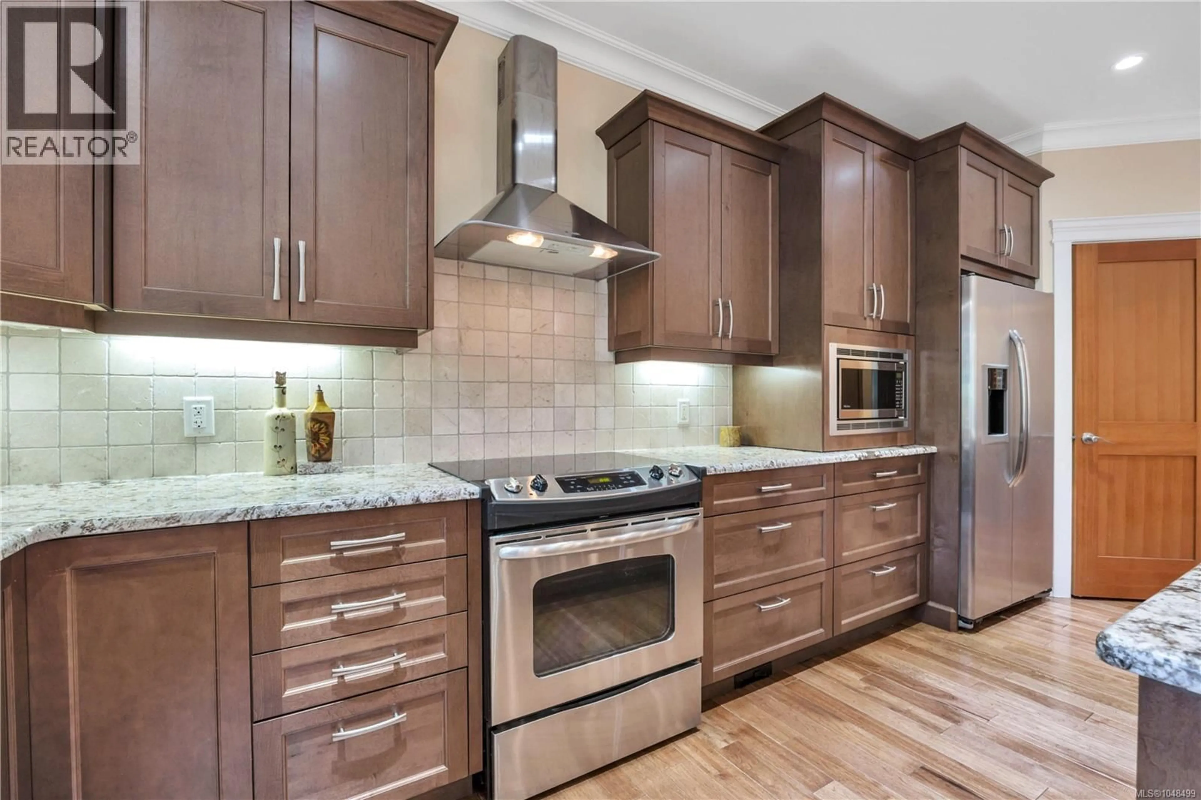 Contemporary kitchen, ceramic/tile floor for 1793 STEWART ROAD, Nanoose Bay British Columbia V9P9E7