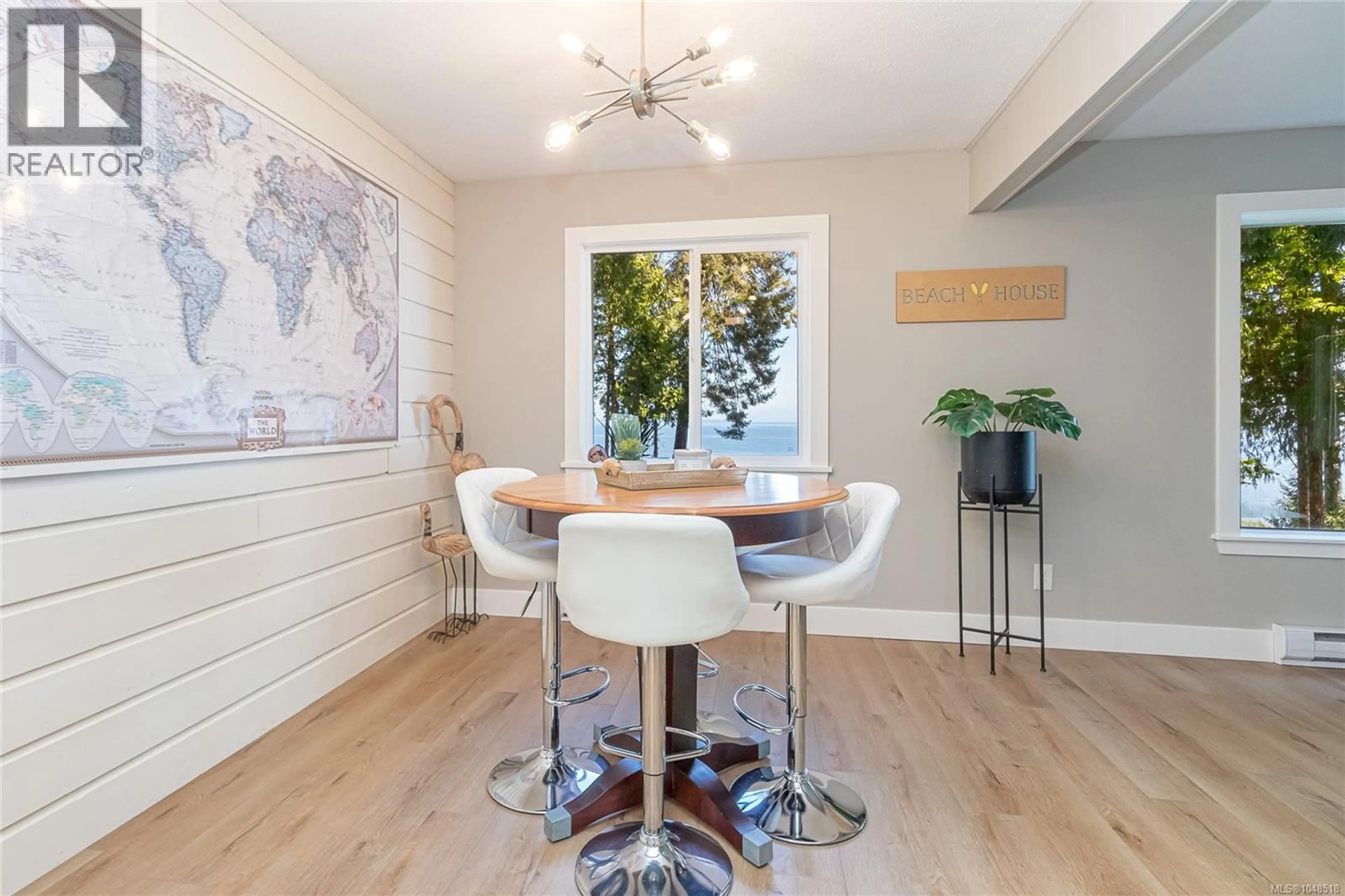 Dining room, wood/laminate floor for 2519 LASQUETI ROAD, Qualicum Beach British Columbia V9K1Z1