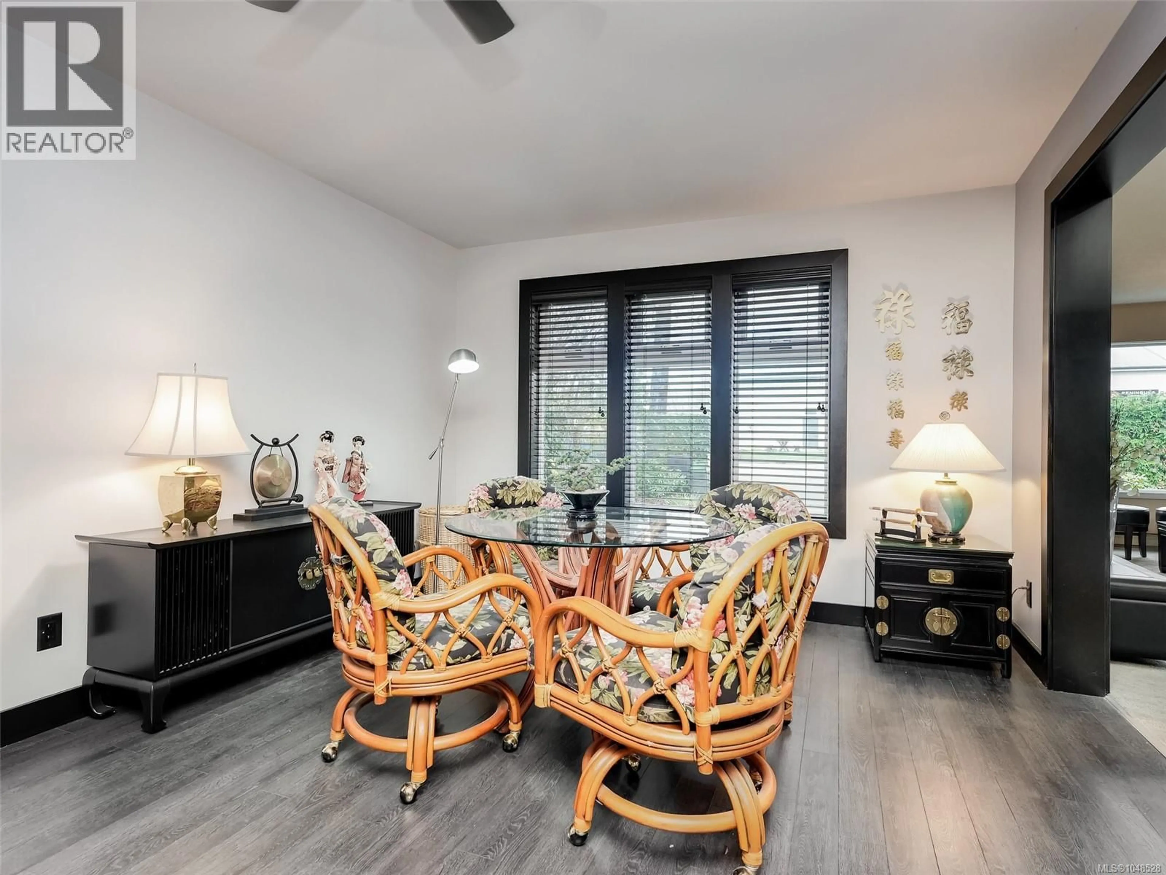 Living room with furniture, wood/laminate floor for 9907 GALARAN ROAD, Sidney British Columbia V8L4G5