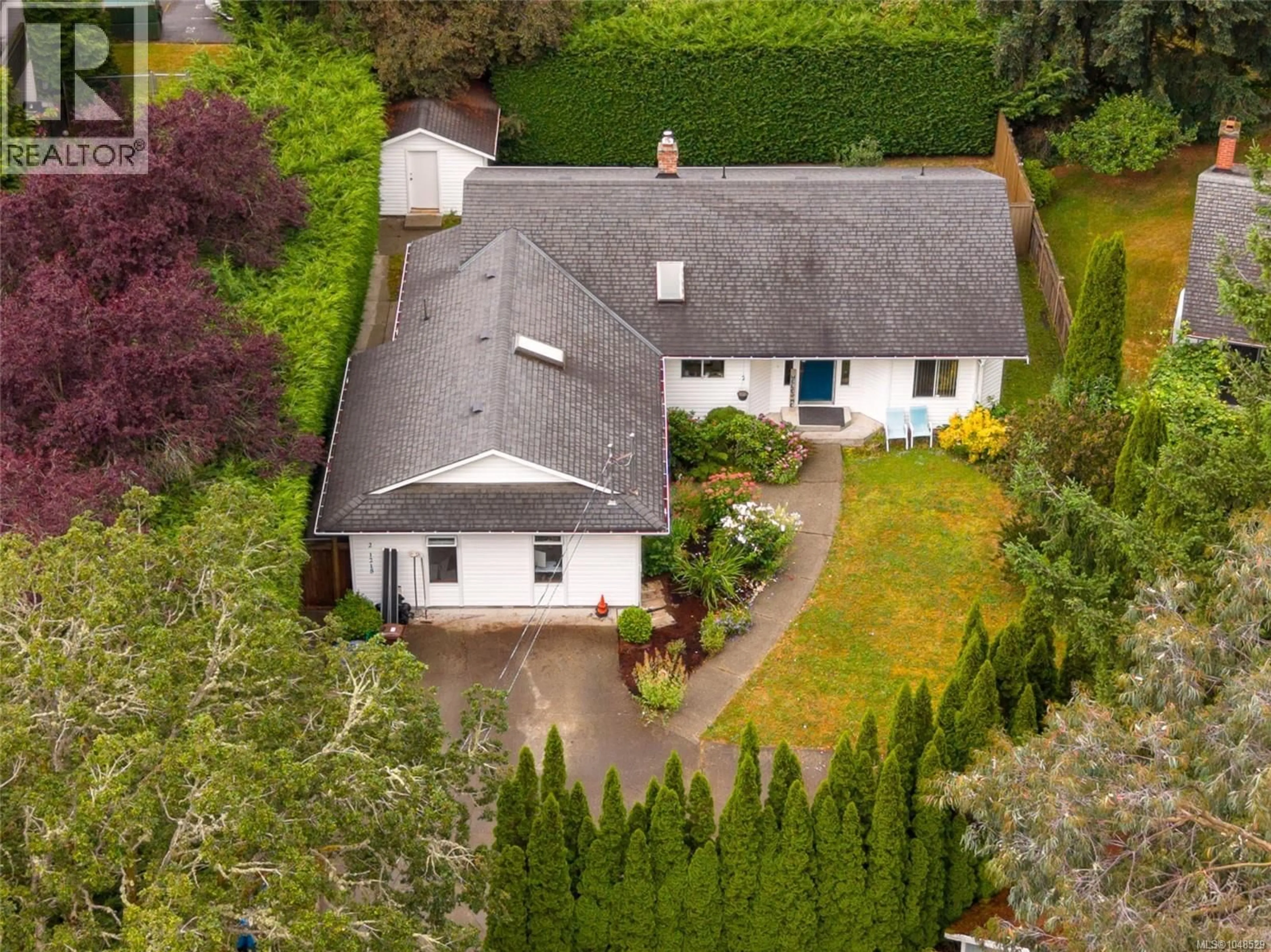 A pic from outside/outdoor area/front of a property/back of a property/a pic from drone, street for 2 - 1215 STELLY'S CROSS ROAD, Central Saanich British Columbia V8M1H3