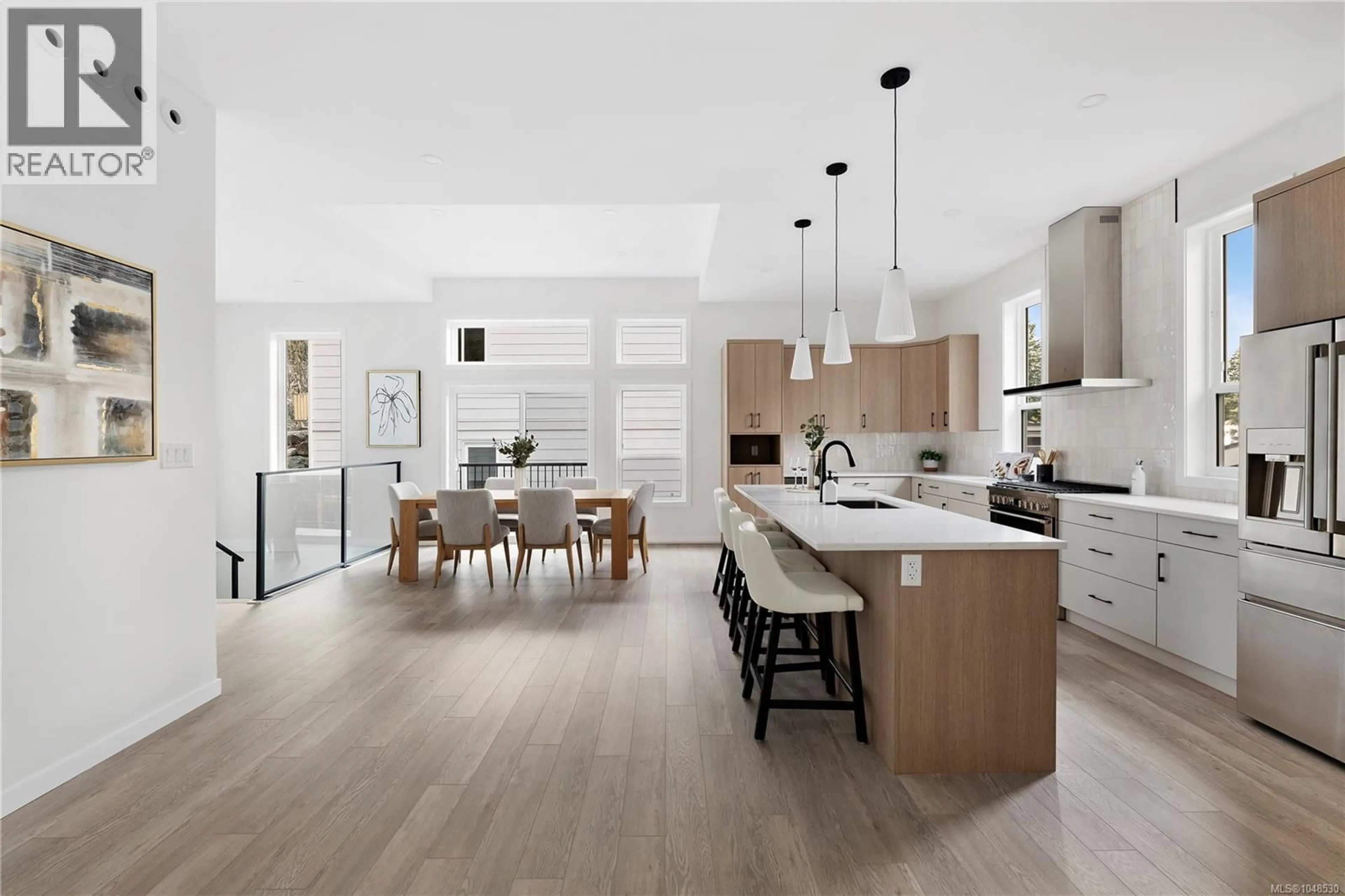 Open concept kitchen, wood/laminate floor for 3624 AUTUMN LANE, Langford British Columbia V9C0S3