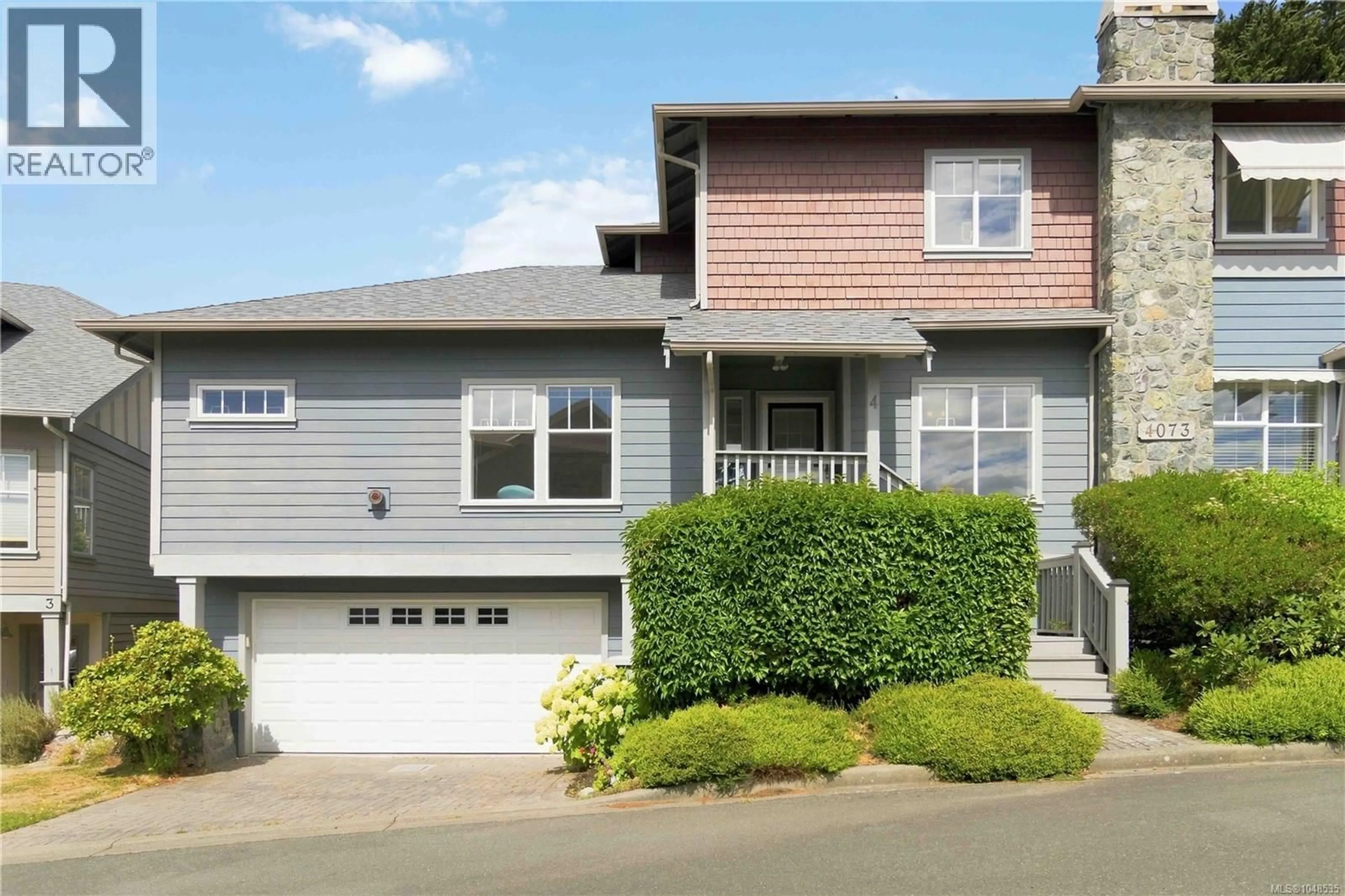 Home with vinyl exterior material, street for 4 - 4073 BLACKBERRY LANE, Saanich British Columbia V8X5J5