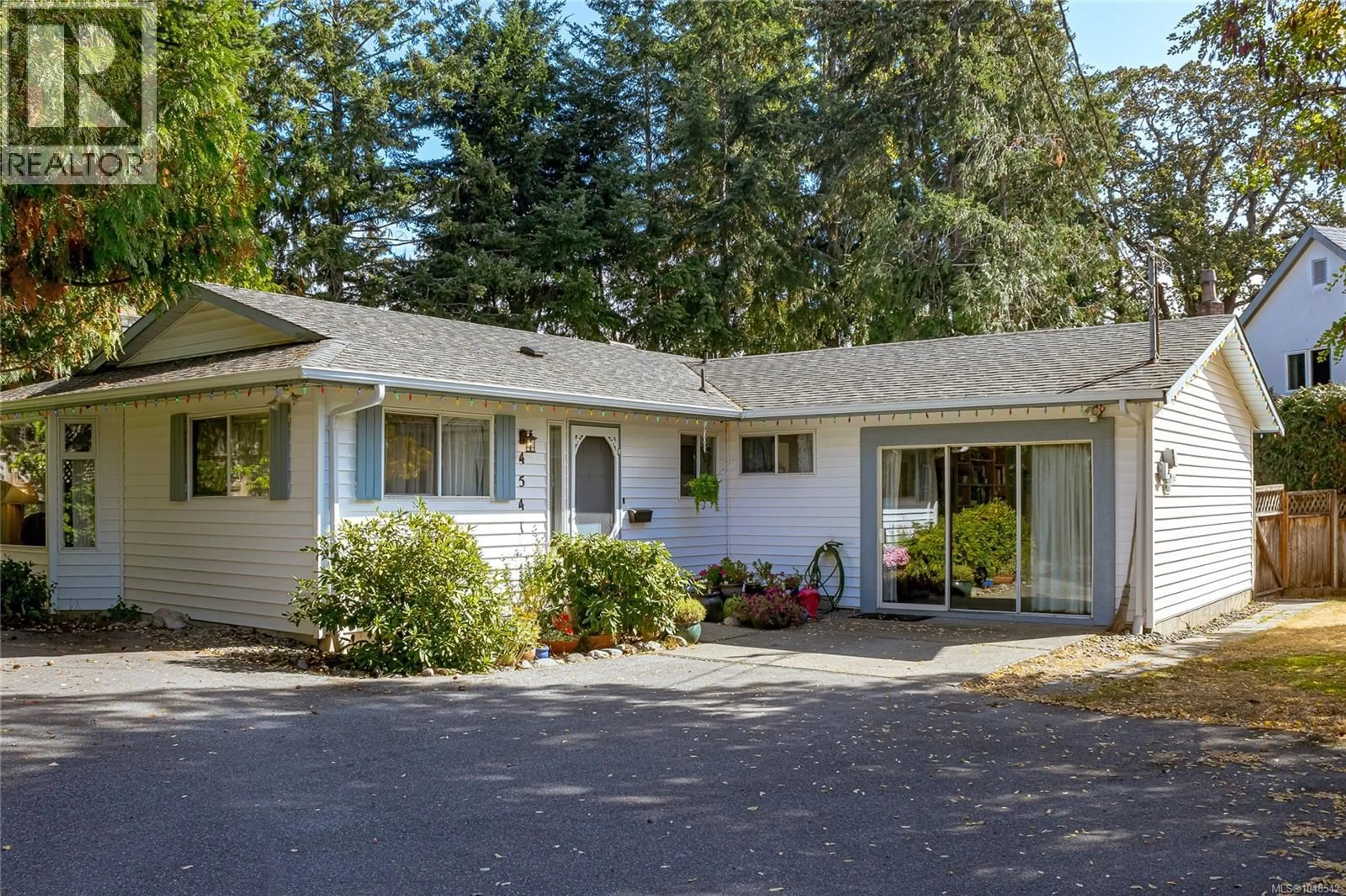 Home with vinyl exterior material, street for 4541 ELK LAKE DRIVE, Saanich British Columbia V8Z6L3