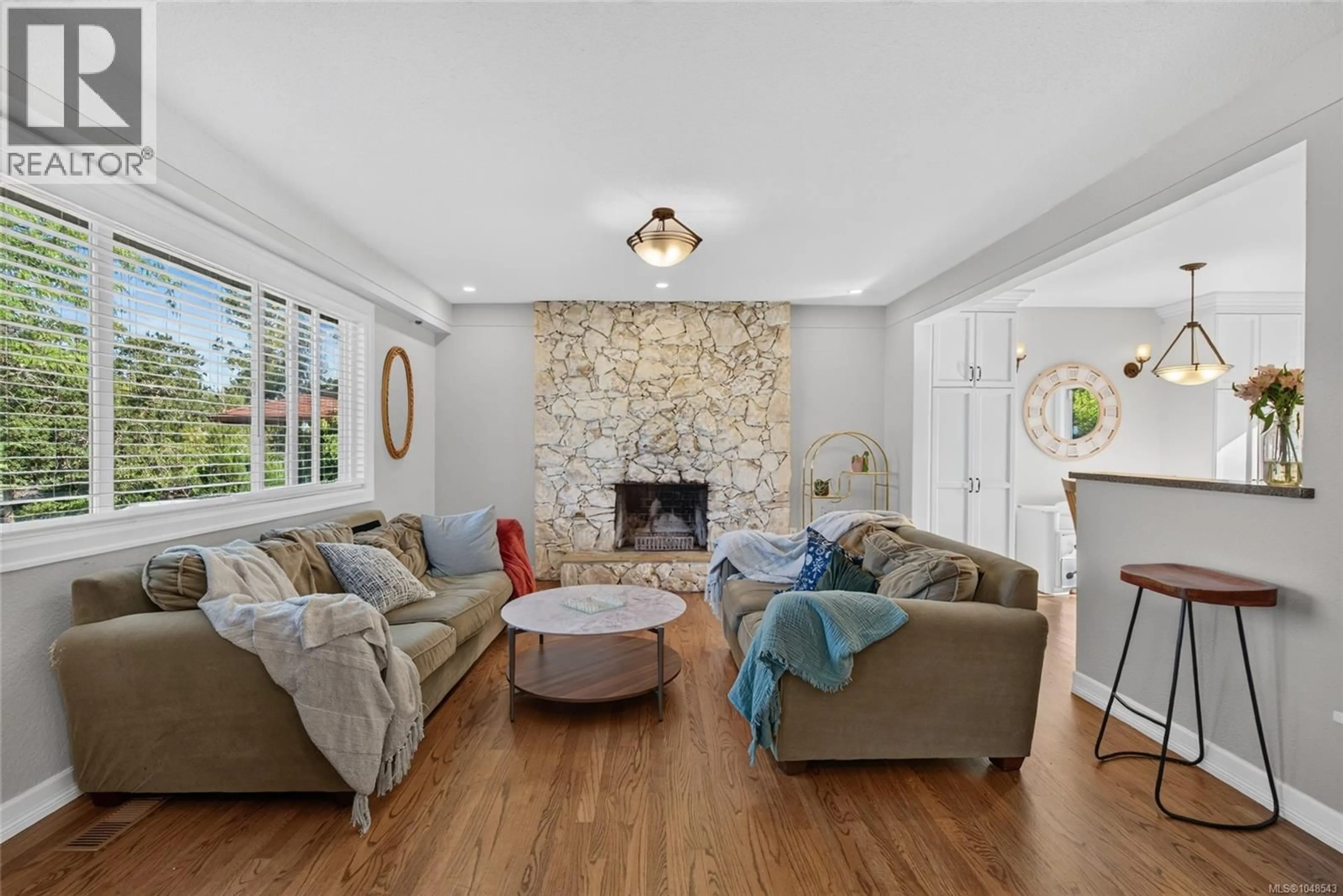 Living room with furniture, ceramic/tile floor for 4257 CAREY ROAD, Saanich British Columbia V8Z4H1