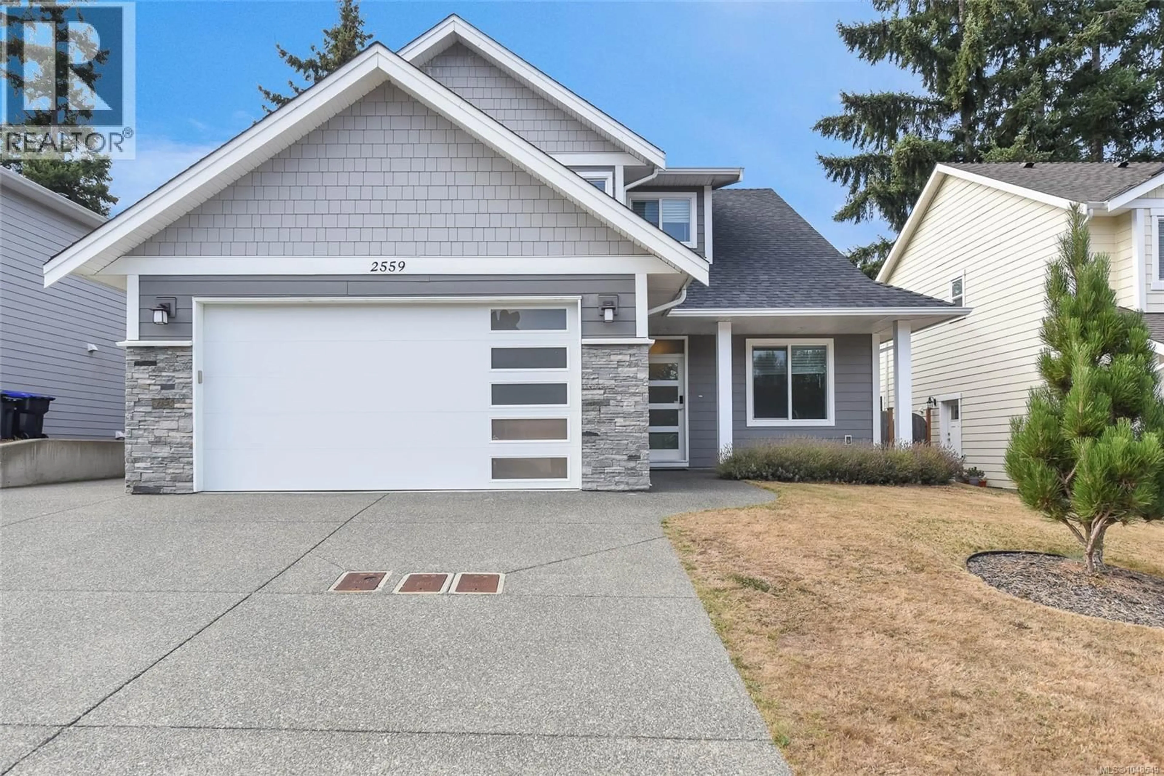 Home with vinyl exterior material, street for 2559 BROOKFIELD DRIVE, Courtenay British Columbia V9N0E6