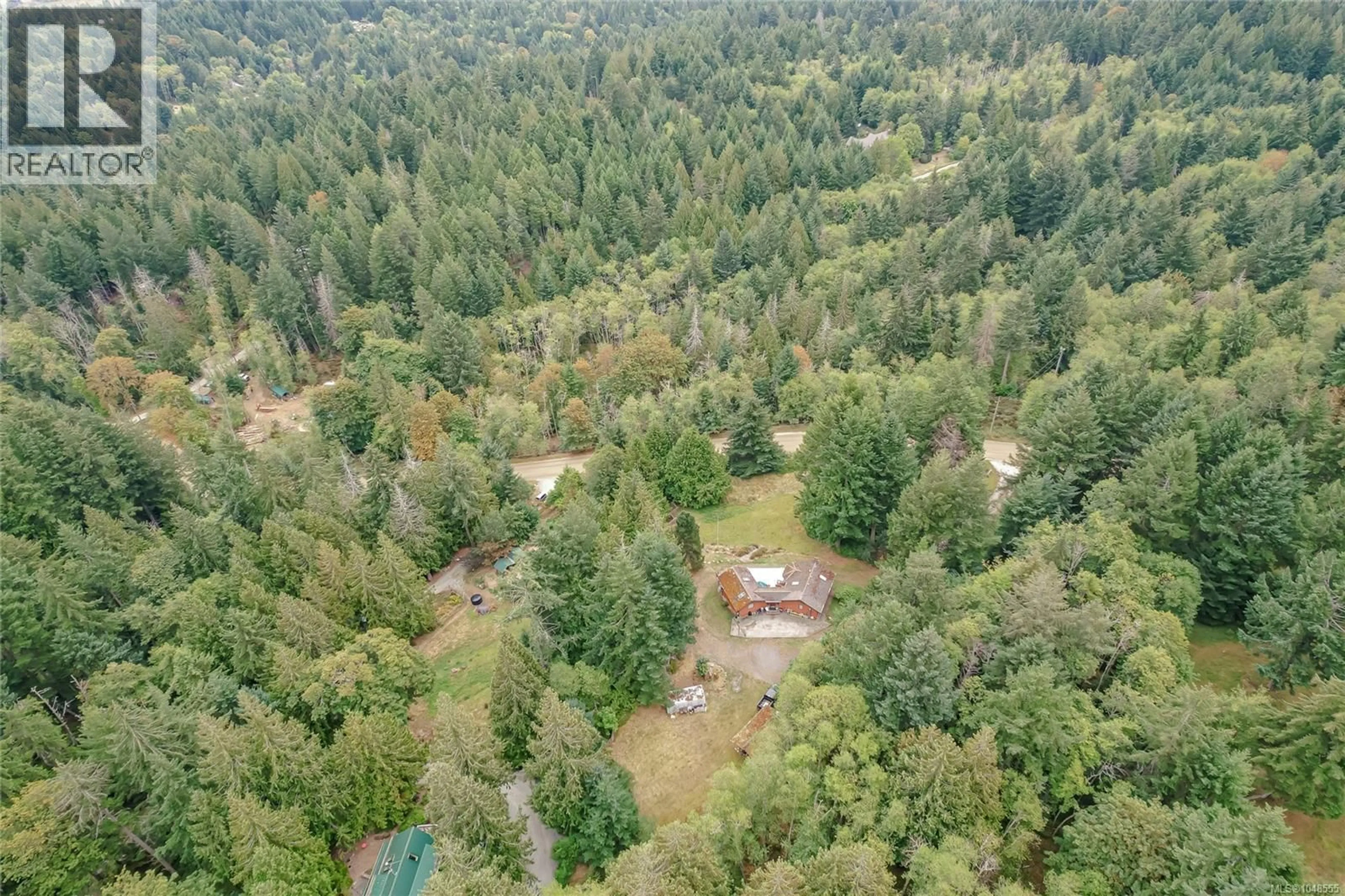 A pic from outside/outdoor area/front of a property/back of a property/a pic from drone, forest/trees view for 190 SEYMOUR HEIGHTS, Salt Spring British Columbia V8K2B6