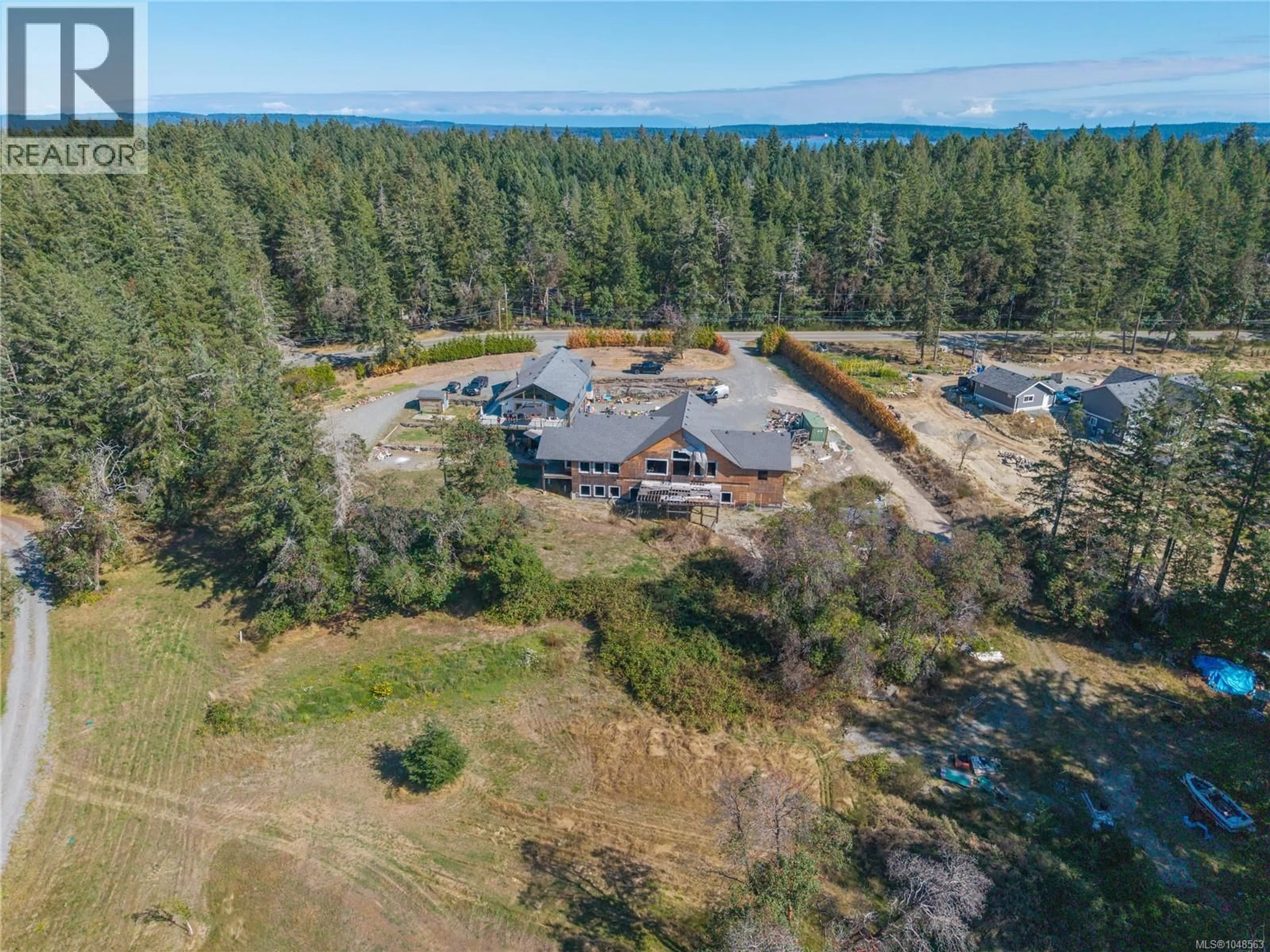 A pic from outside/outdoor area/front of a property/back of a property/a pic from drone, water/lake/river/ocean view for 3824 YELLOW POINT ROAD, Nanaimo British Columbia V9G1E9