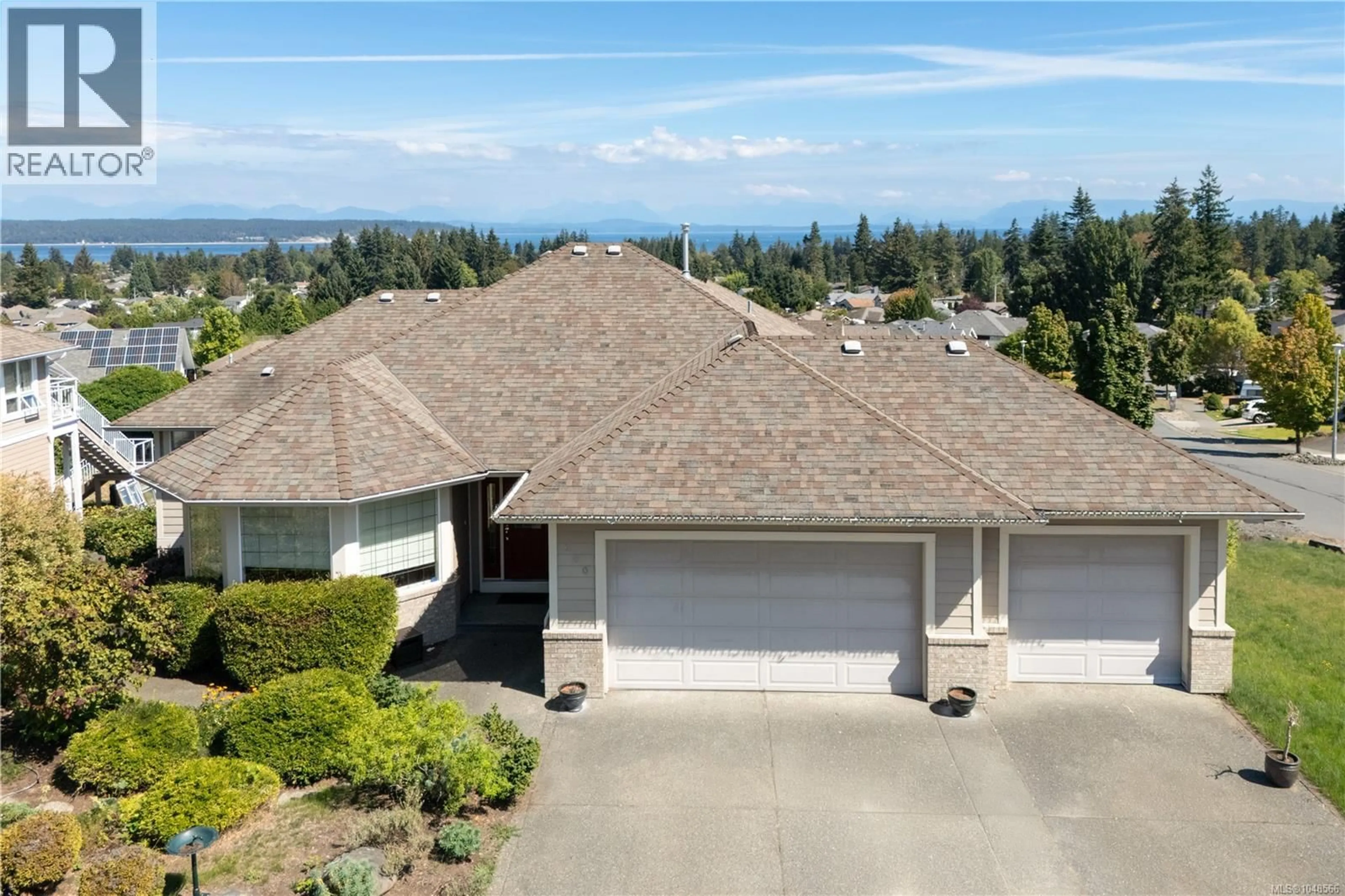 A pic from outside/outdoor area/front of a property/back of a property/a pic from drone, mountain view for 600 MARINER DRIVE, Campbell River British Columbia V9H1V9