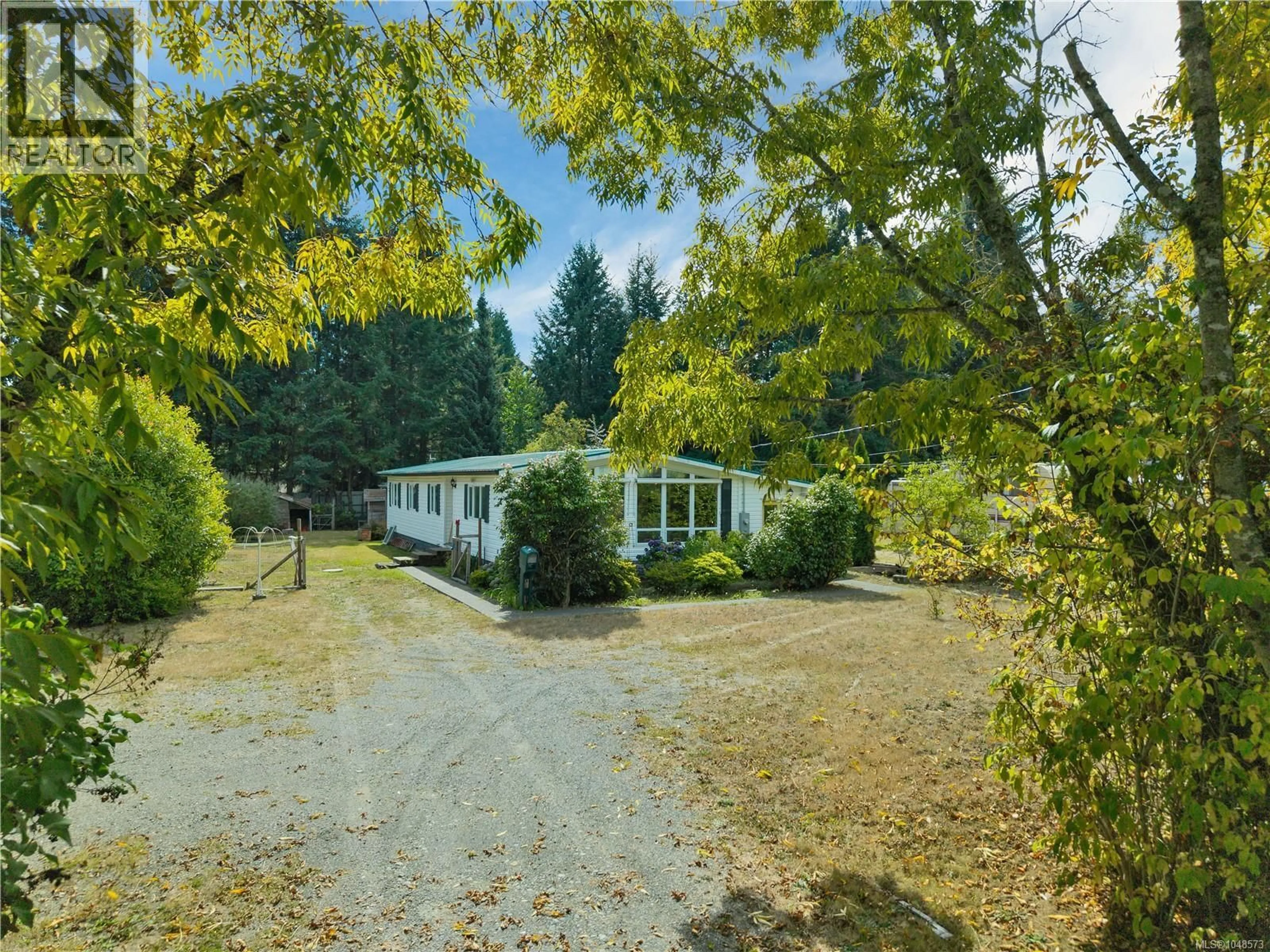 A pic from outside/outdoor area/front of a property/back of a property/a pic from drone, forest/trees view for 2259 UPLAND ROAD, Campbell River British Columbia V9H1C1