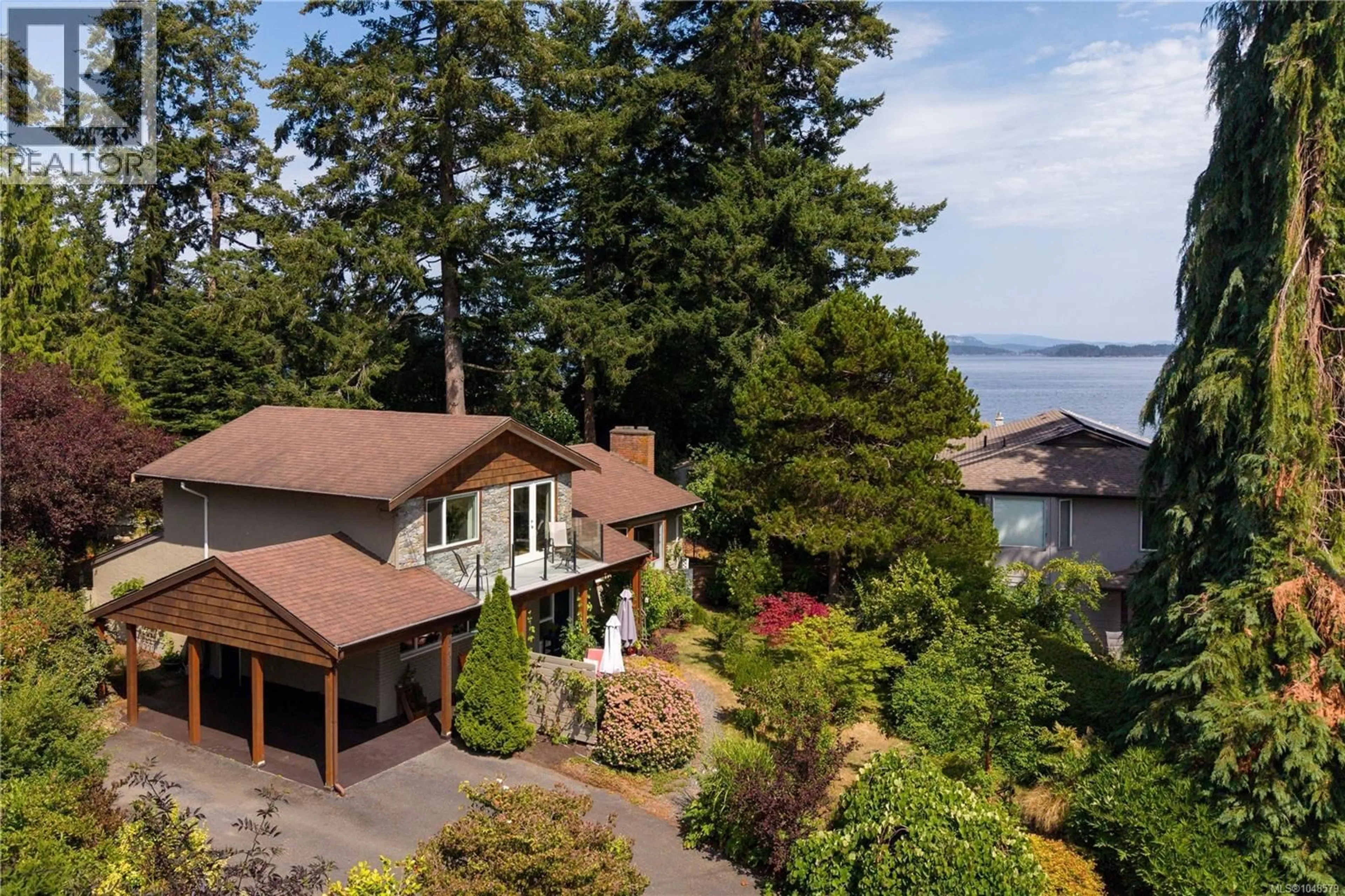 A pic from outside/outdoor area/front of a property/back of a property/a pic from drone, water/lake/river/ocean view for 10496 JOCELYN PLACE, Sidney British Columbia V8L2P5
