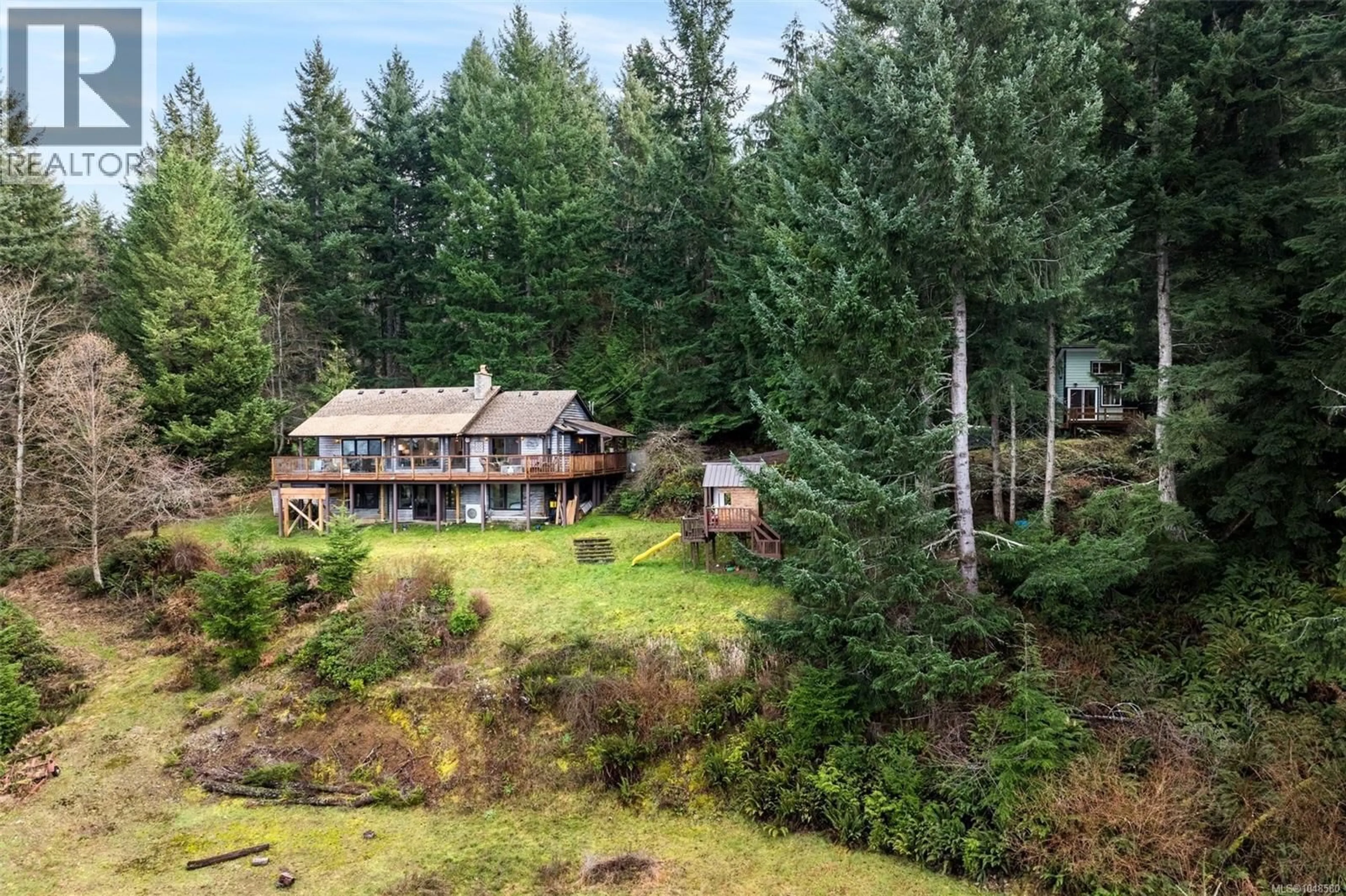 A pic from outside/outdoor area/front of a property/back of a property/a pic from drone, forest/trees view for 1691 STRATHCONA HEIGHTS ROAD, Shawnigan Lake British Columbia V8H2A9