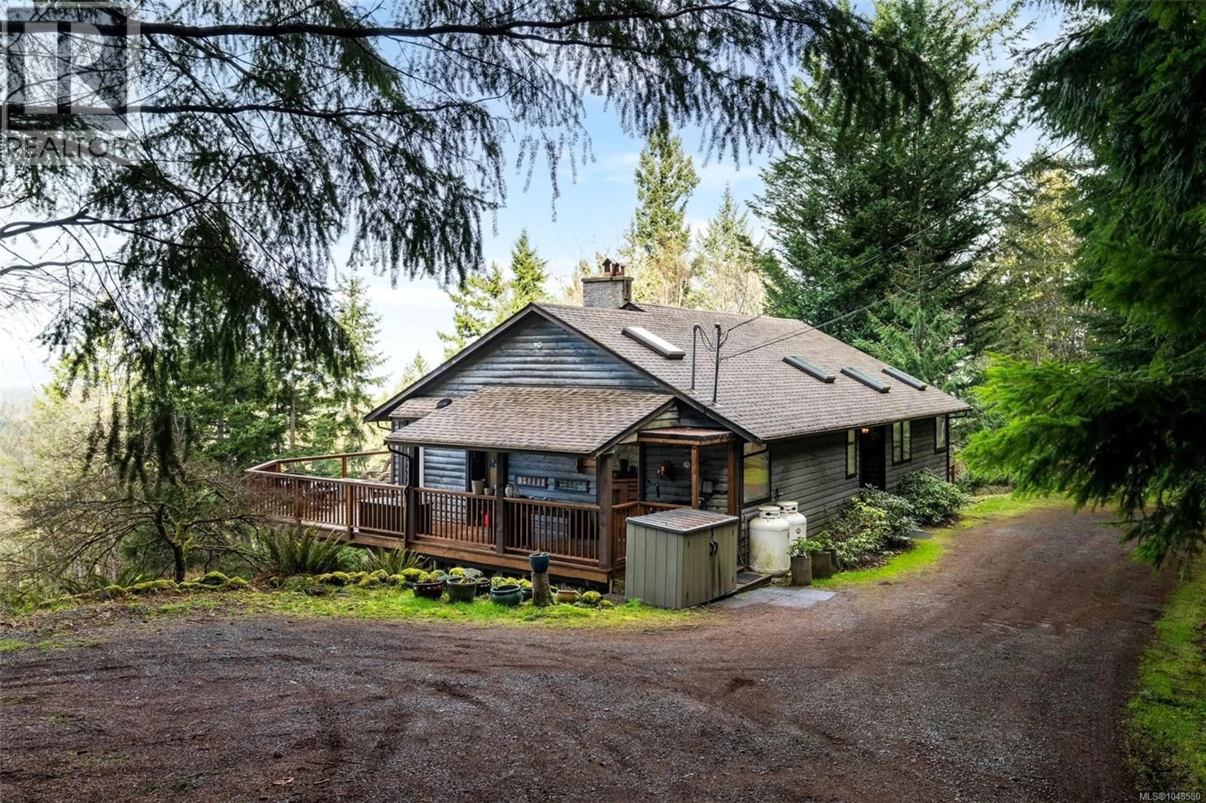 A pic from outside/outdoor area/front of a property/back of a property/a pic from drone, unknown for 1691 STRATHCONA HEIGHTS ROAD, Shawnigan Lake British Columbia V8H2A9