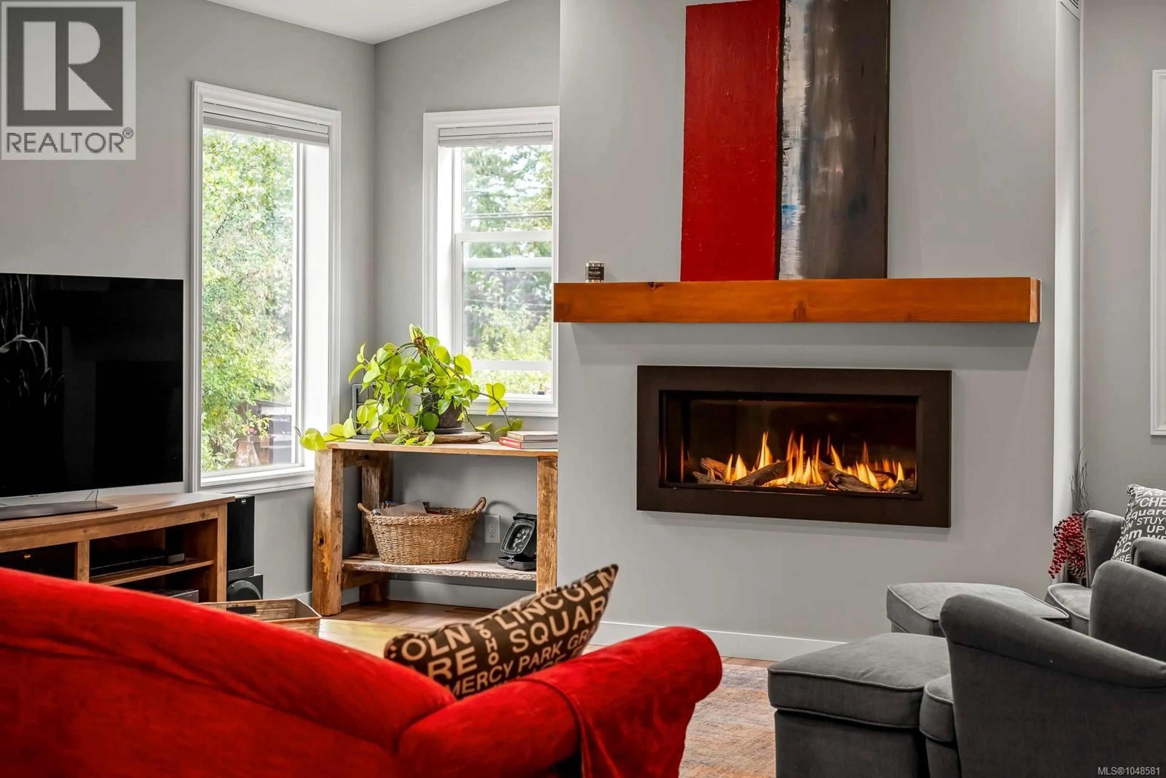Living room with furniture, wood/laminate floor for 3868 ROYSTON ROAD, Royston British Columbia V0R2V0