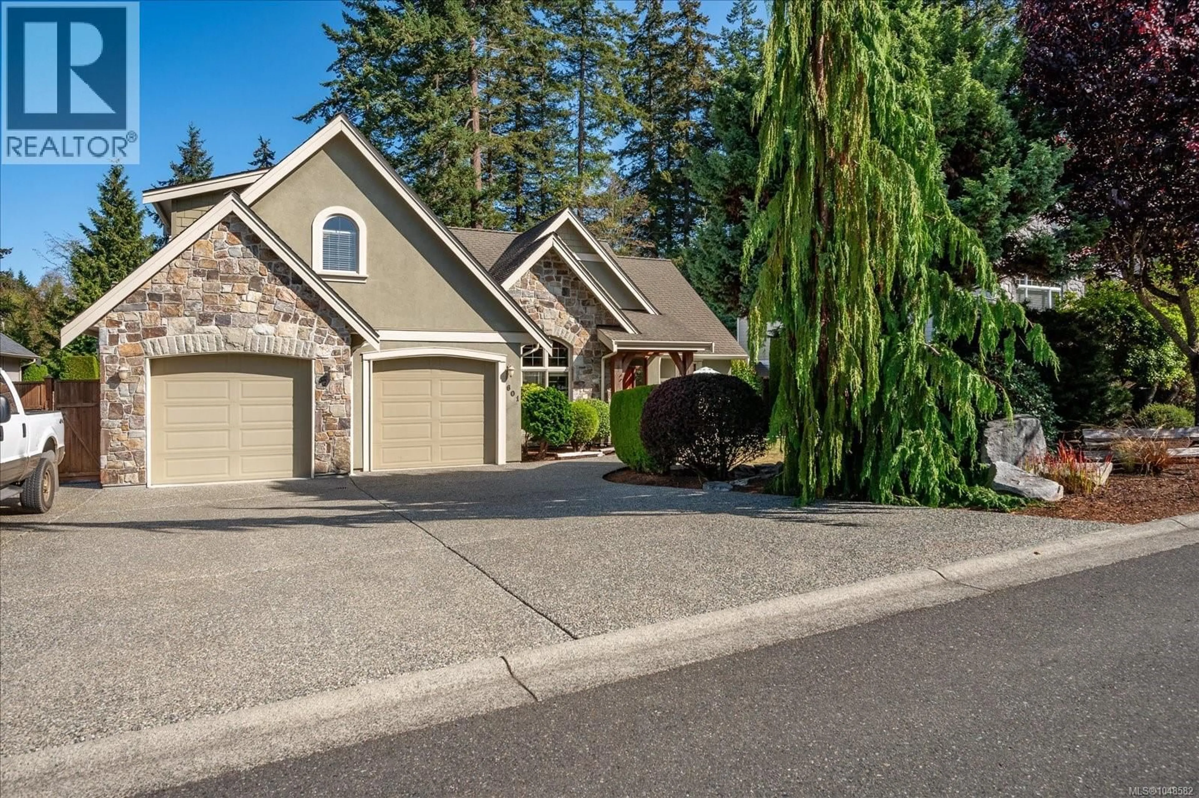 Home with vinyl exterior material, street for 601 MEADOW DRIVE, French Creek British Columbia V9K2T2