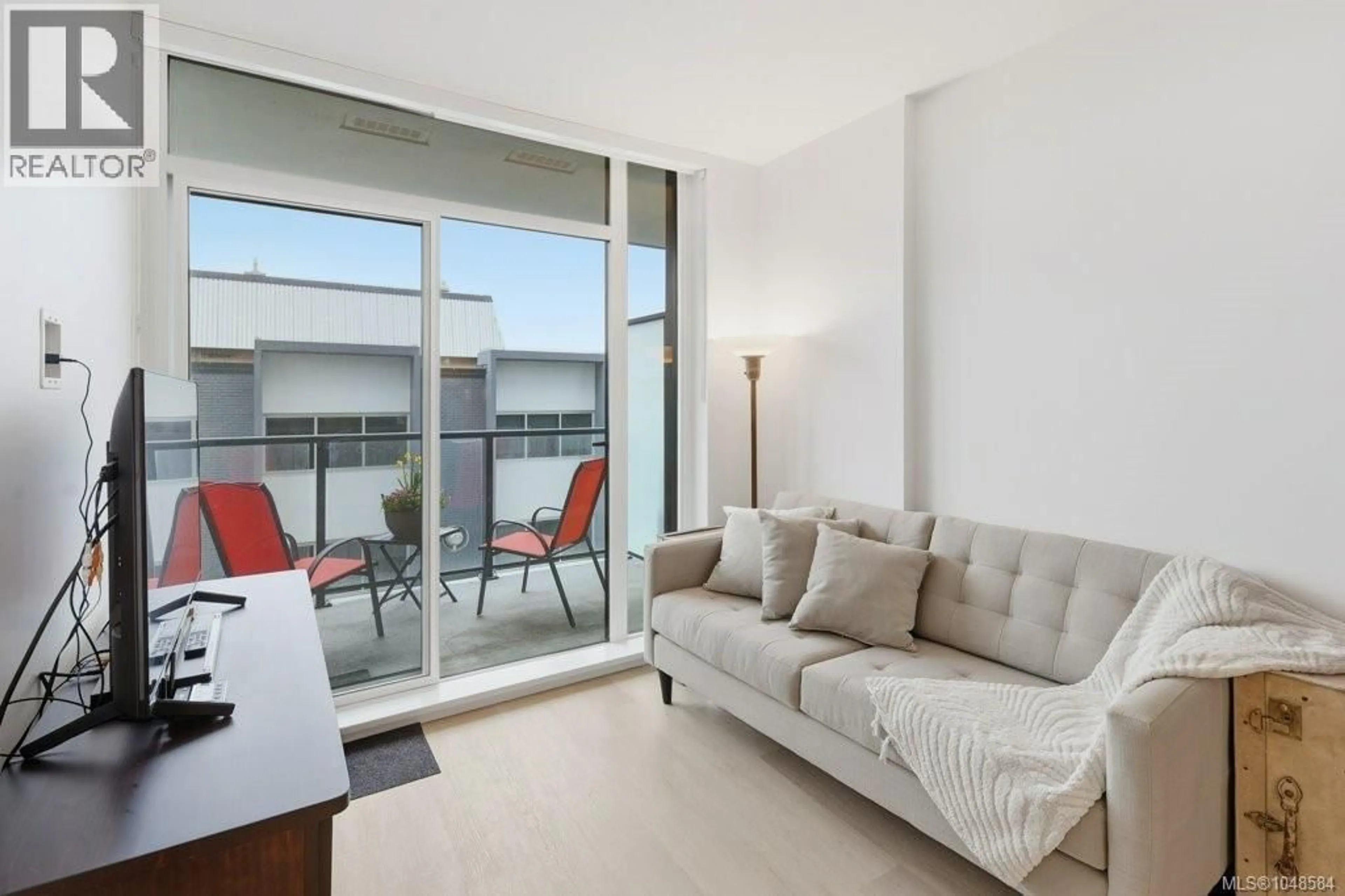 Living room with furniture, unknown for 606 - 1100 YATES STREET, Victoria British Columbia V8V0H5