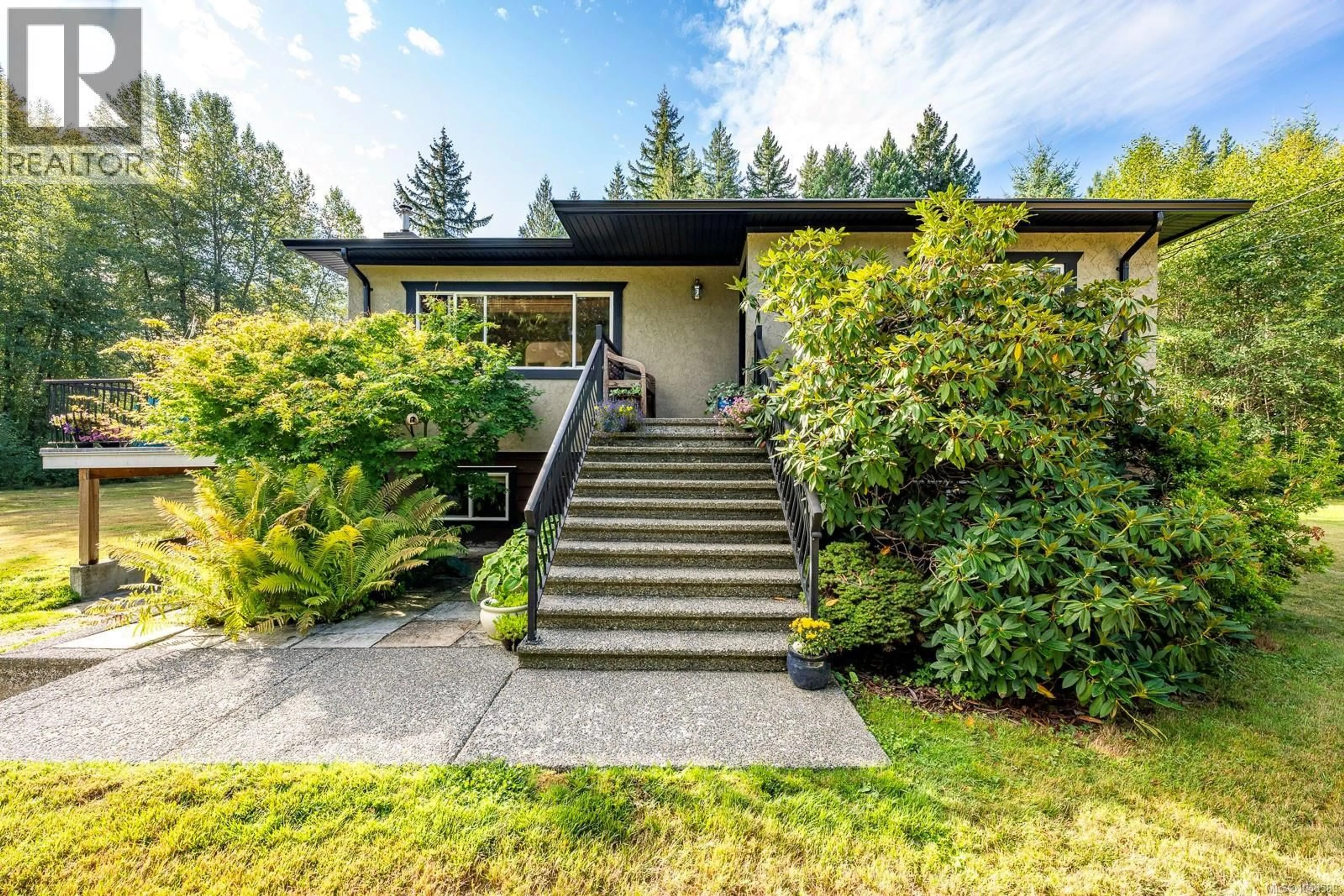 Home with vinyl exterior material, street for 2945 ROYSTON ROAD, Cumberland British Columbia V0R1S0