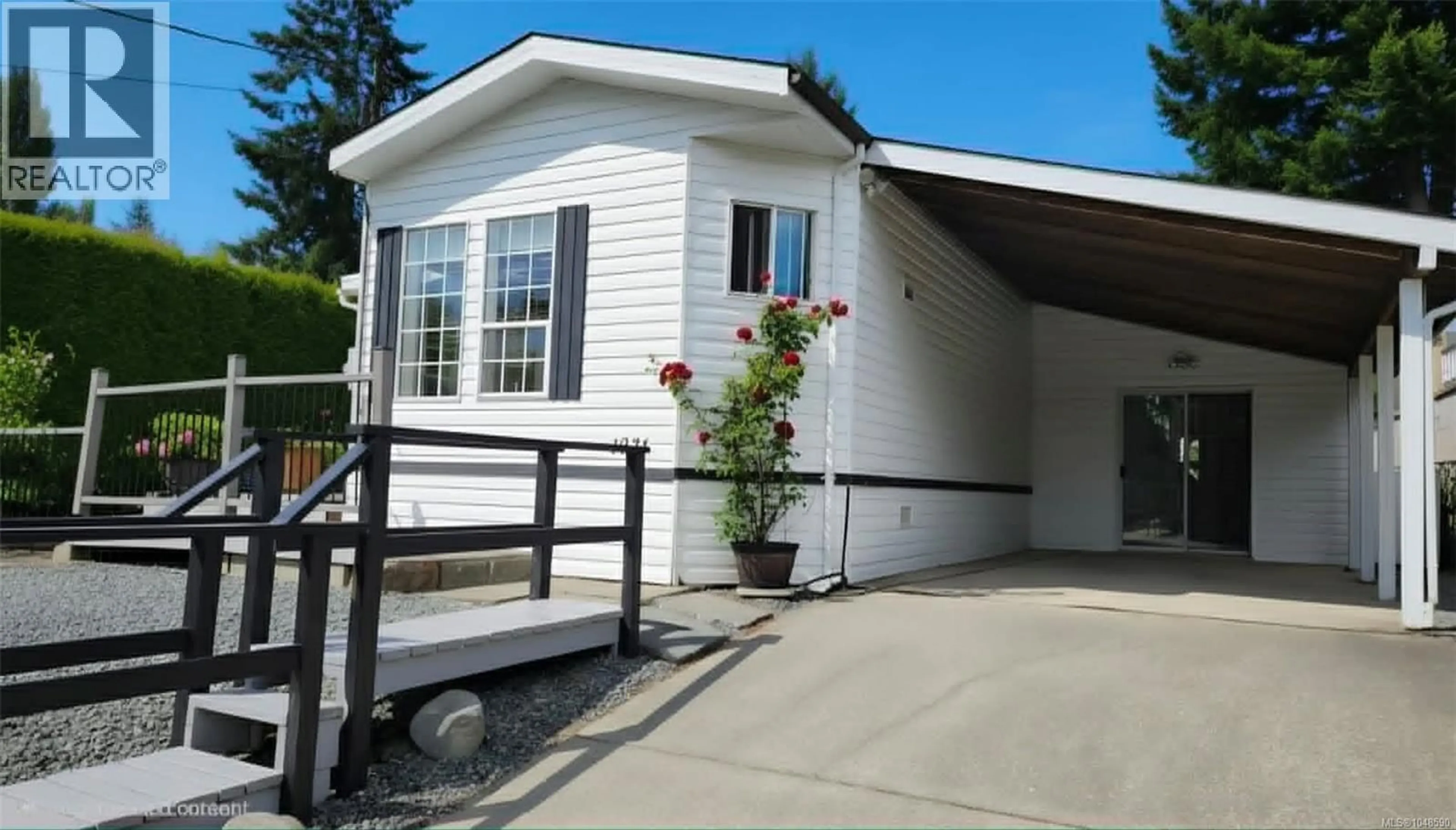 Home with vinyl exterior material, street for 1071 BOURBAN ROAD, Mill Bay British Columbia V0R2P2