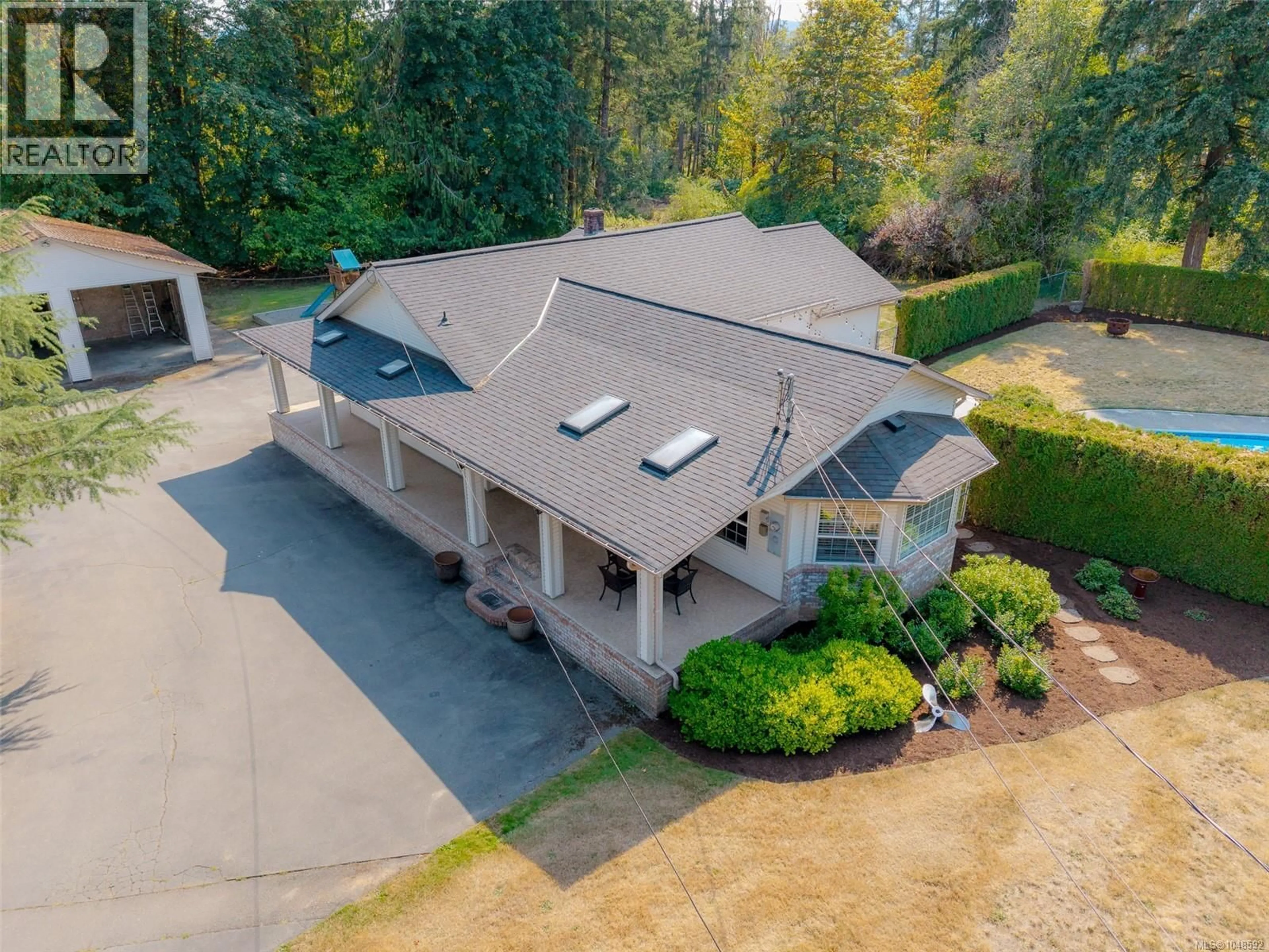 A pic from outside/outdoor area/front of a property/back of a property/a pic from drone, unknown for 6038 KIRKPATRICK ROAD, Port Alberni British Columbia V9Y8X4