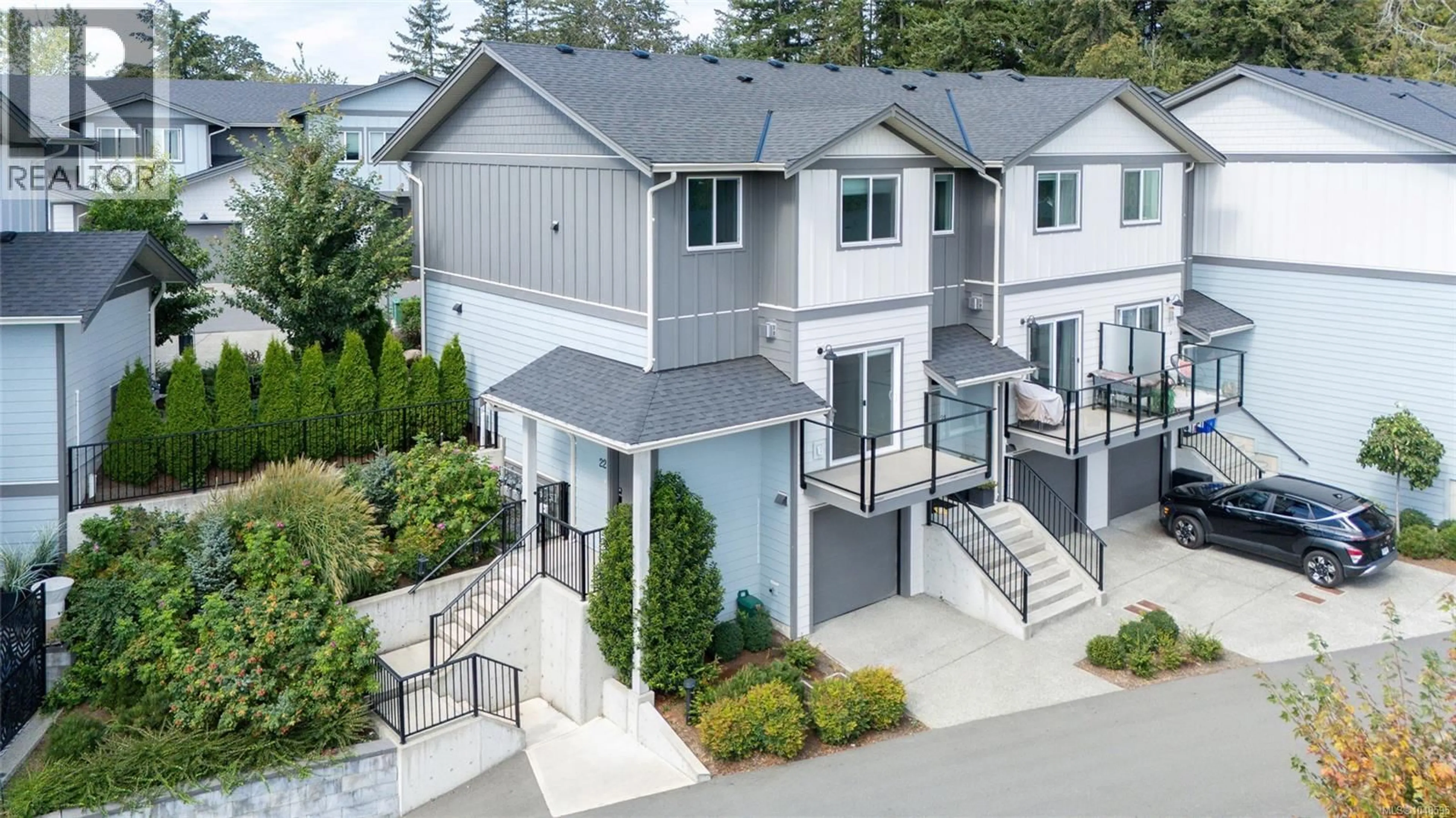 A pic from outside/outdoor area/front of a property/back of a property/a pic from drone, street for 22 - 3195 HERONS WAY, Duncan British Columbia V9L0H8