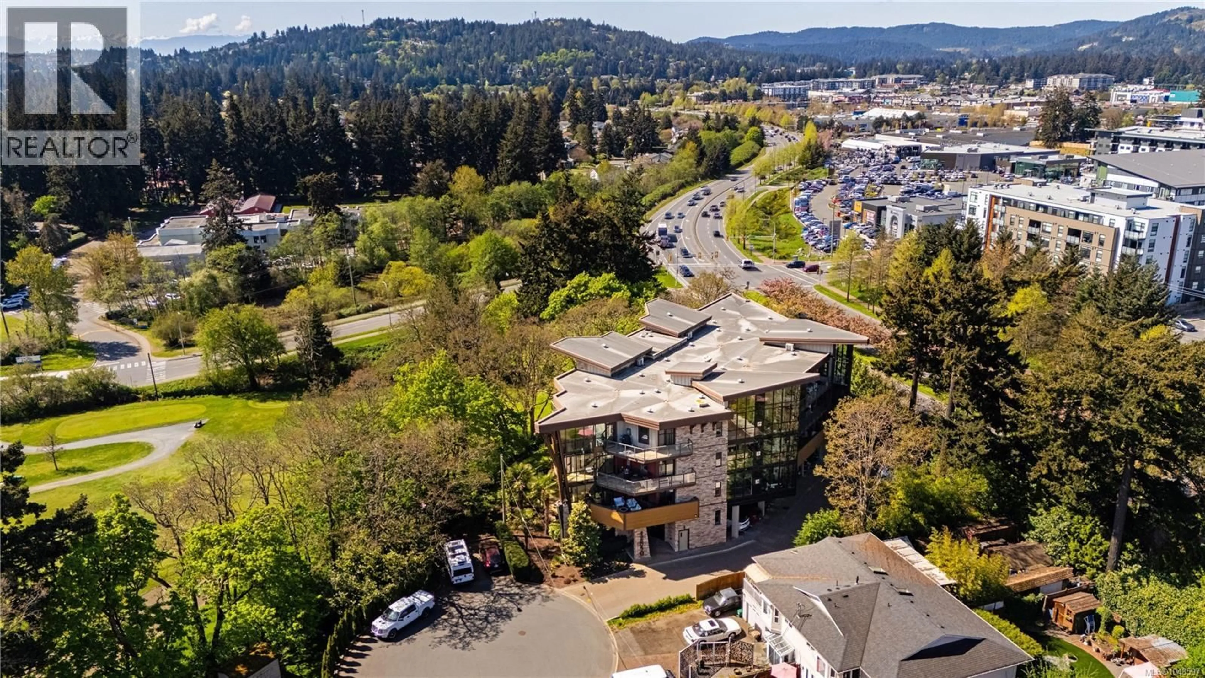 A pic from outside/outdoor area/front of a property/back of a property/a pic from drone, unknown for 402 - 2850 ALDWYND ROAD, Langford British Columbia V9B3S7