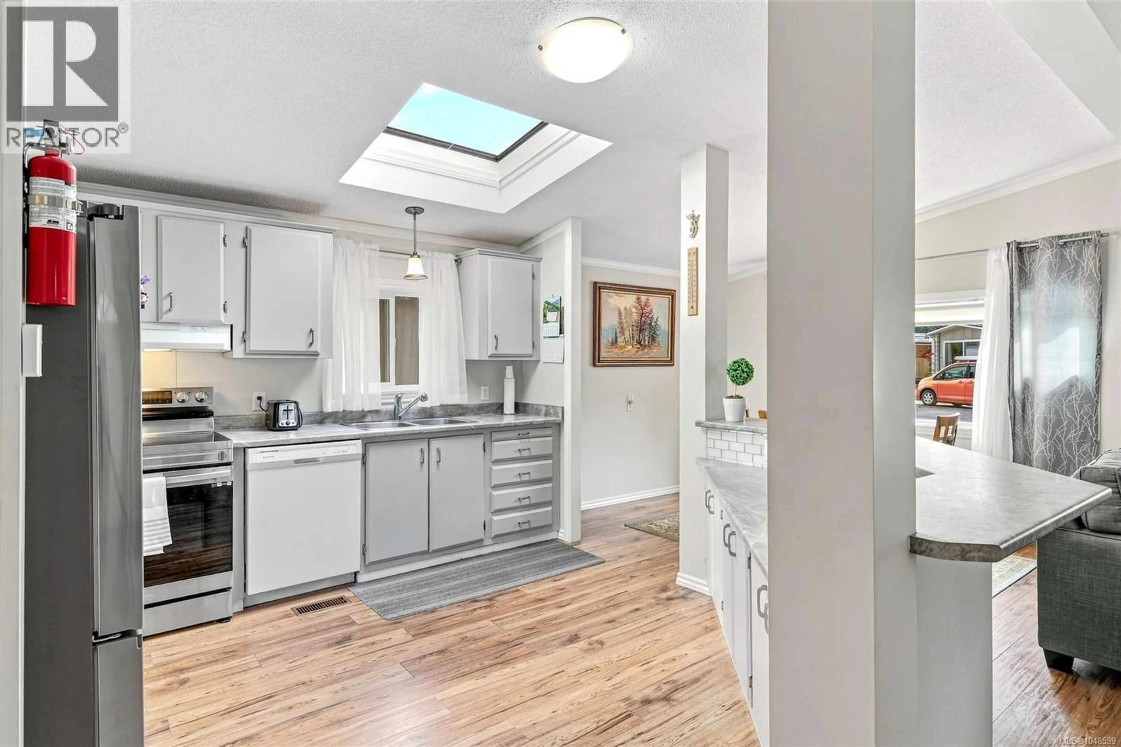 Open concept kitchen, ceramic/tile floor for 64 - 5854 TURNER ROAD, Nanaimo British Columbia V9T2N6