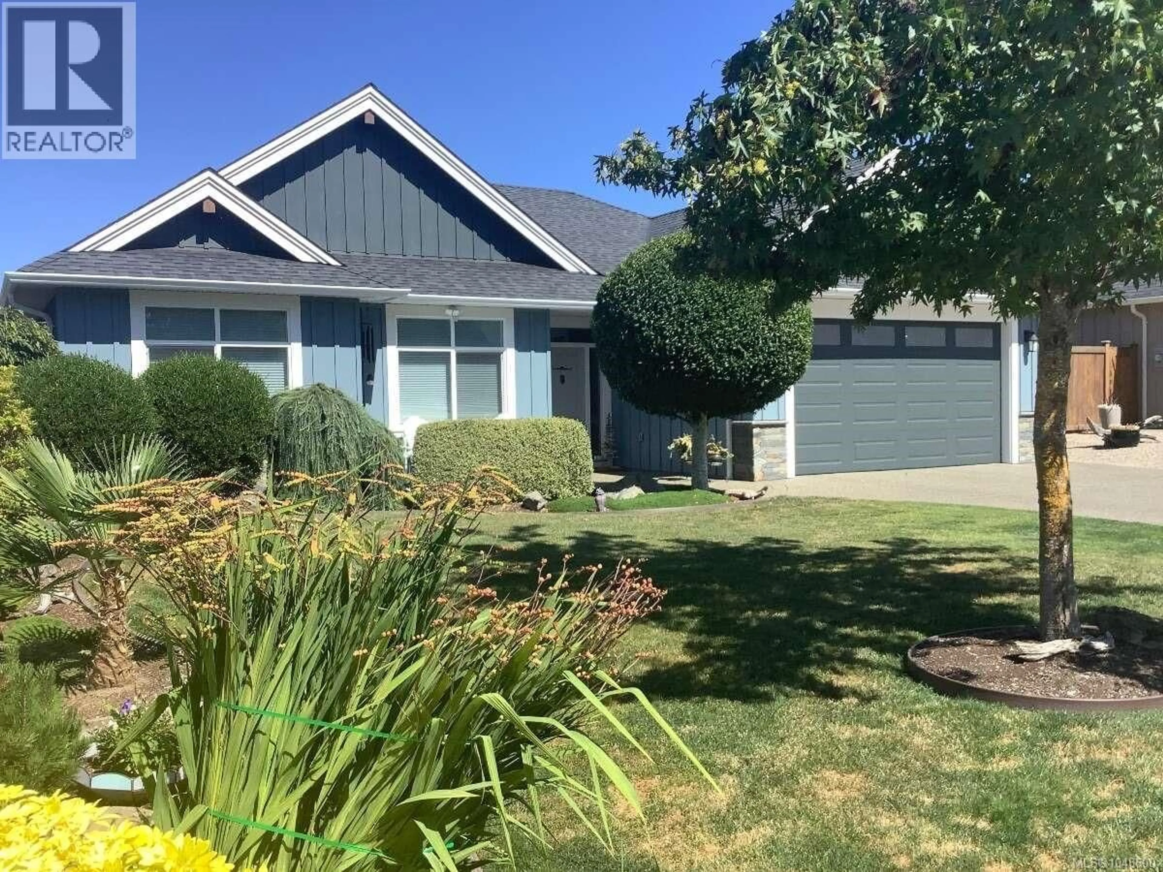 Home with vinyl exterior material, street for 498 RIDGEFIELD DRIVE, Parksville British Columbia V9P0E2