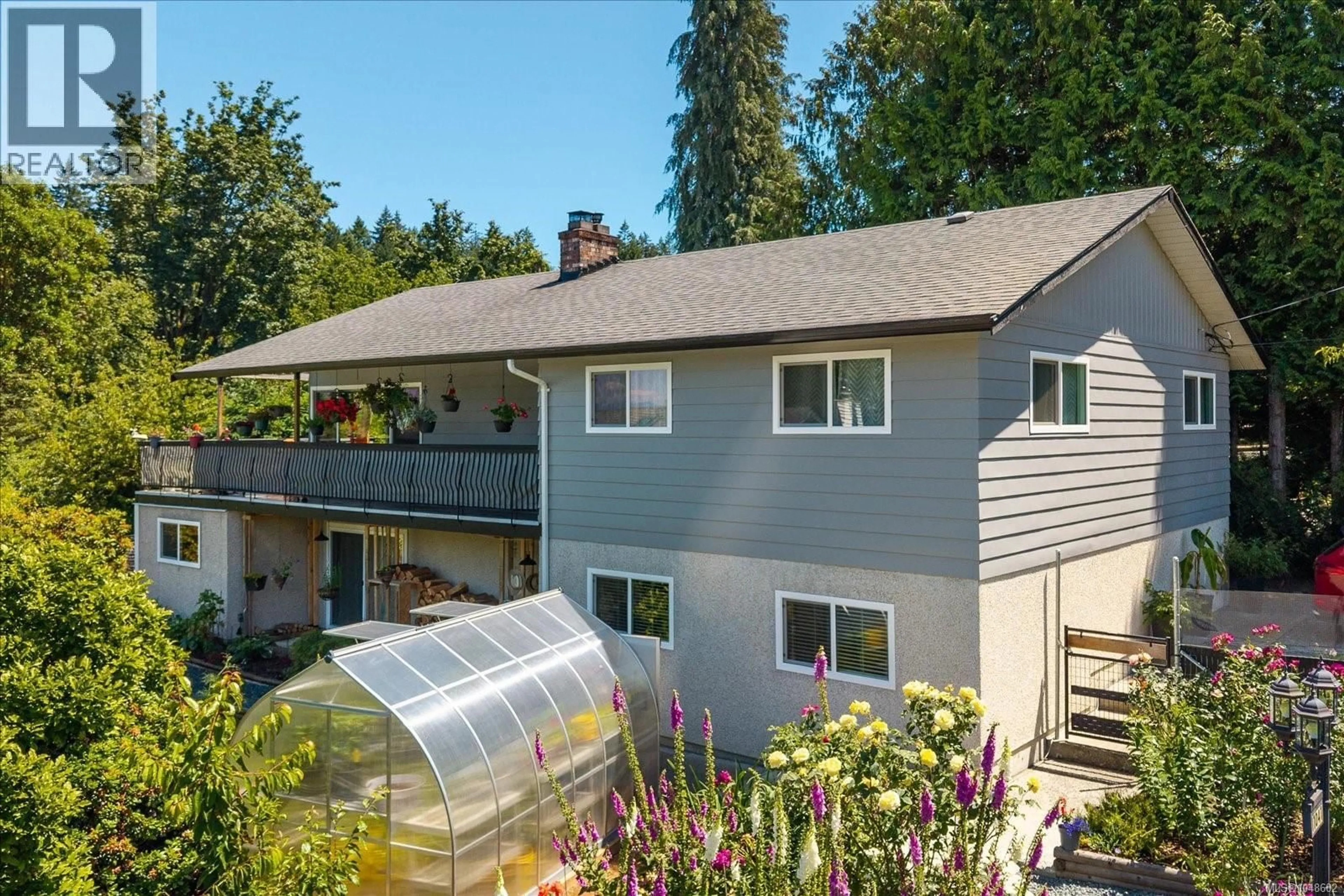 A pic from outside/outdoor area/front of a property/back of a property/a pic from drone, unknown for 11041 CHEMAINUS ROAD, Ladysmith British Columbia V9G1Z2