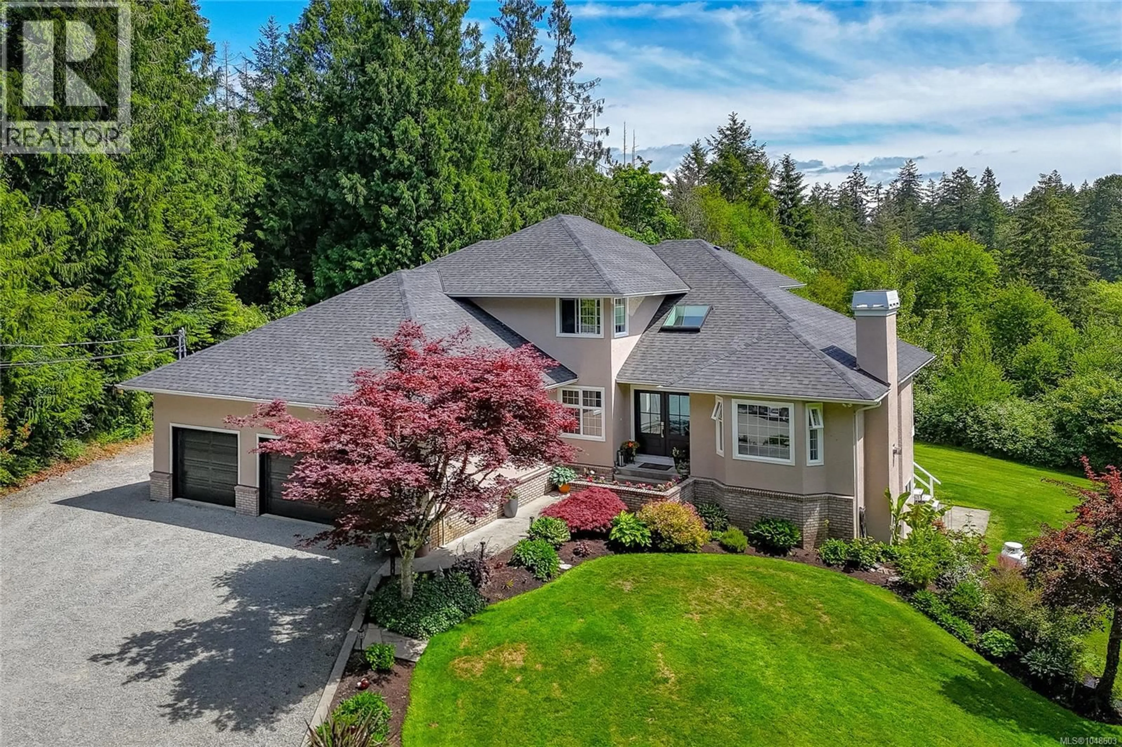 A pic from outside/outdoor area/front of a property/back of a property/a pic from drone, unknown for 1650 TATLOW ROAD, North Saanich British Columbia V8L5R3