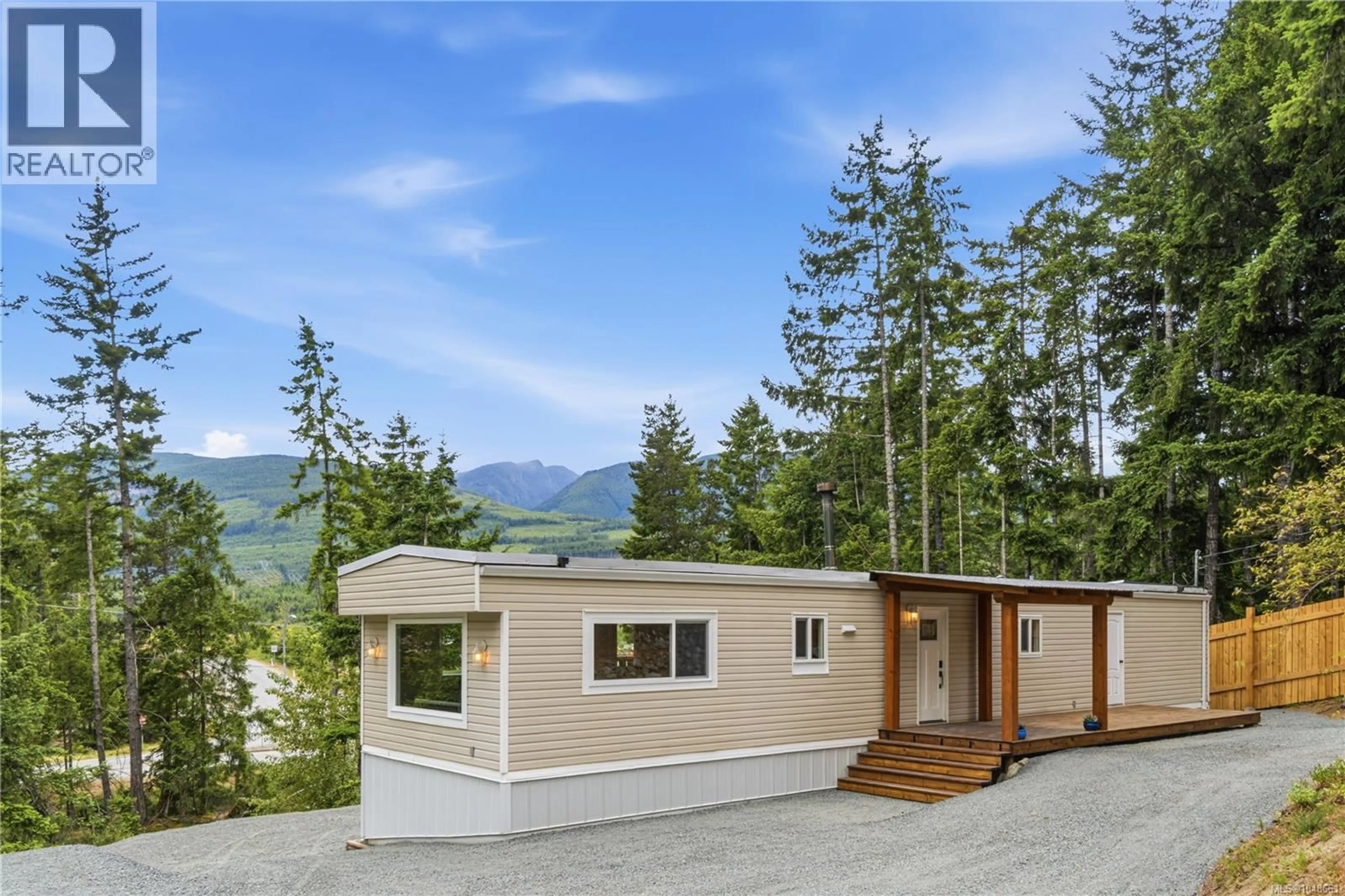 Home with vinyl exterior material, mountain view for 3840 MELROSE ROAD, Whiskey Creek British Columbia V9K2M9