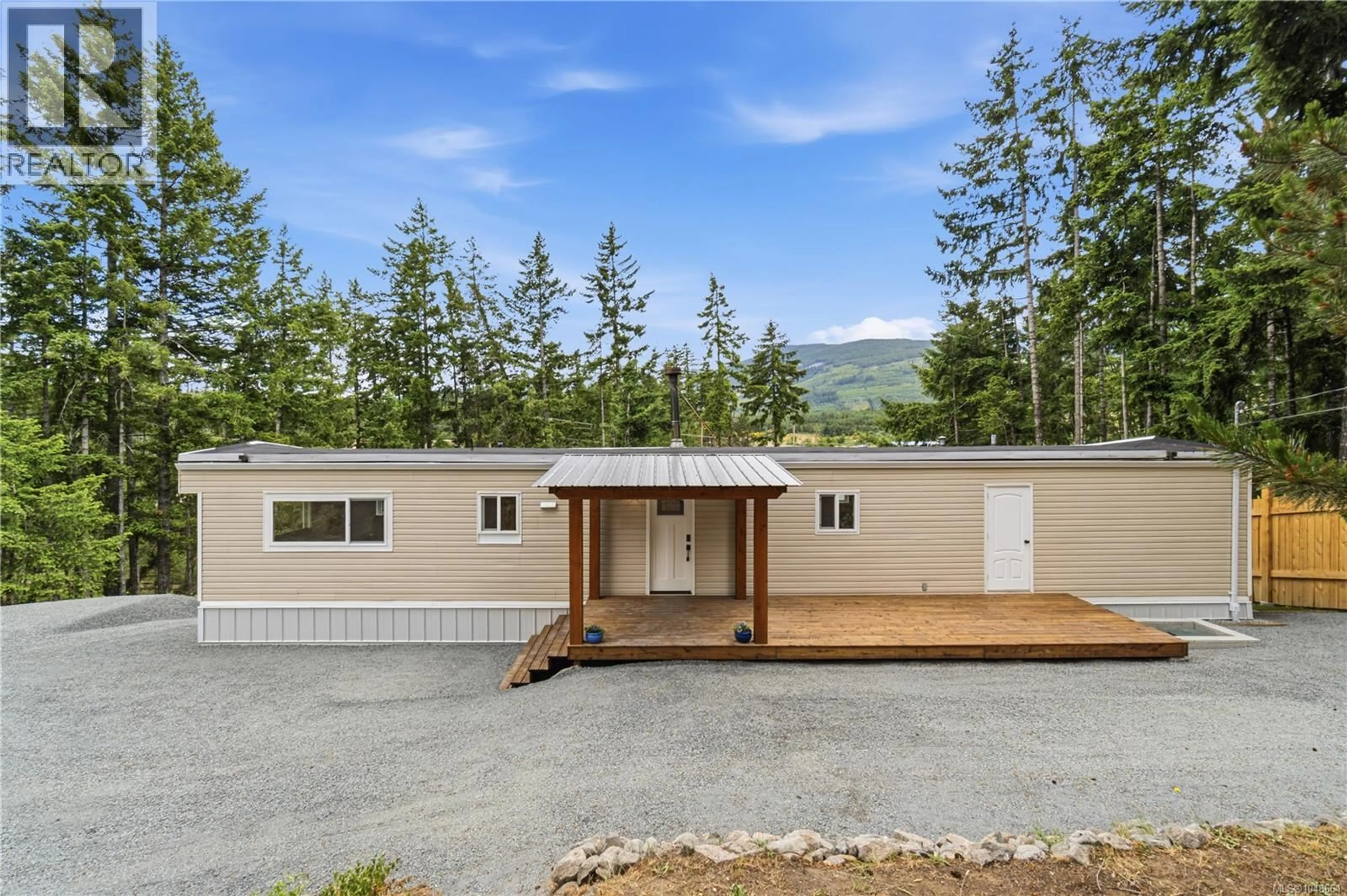 Home with vinyl exterior material, mountain view for 3840 MELROSE ROAD, Whiskey Creek British Columbia V9K2M9