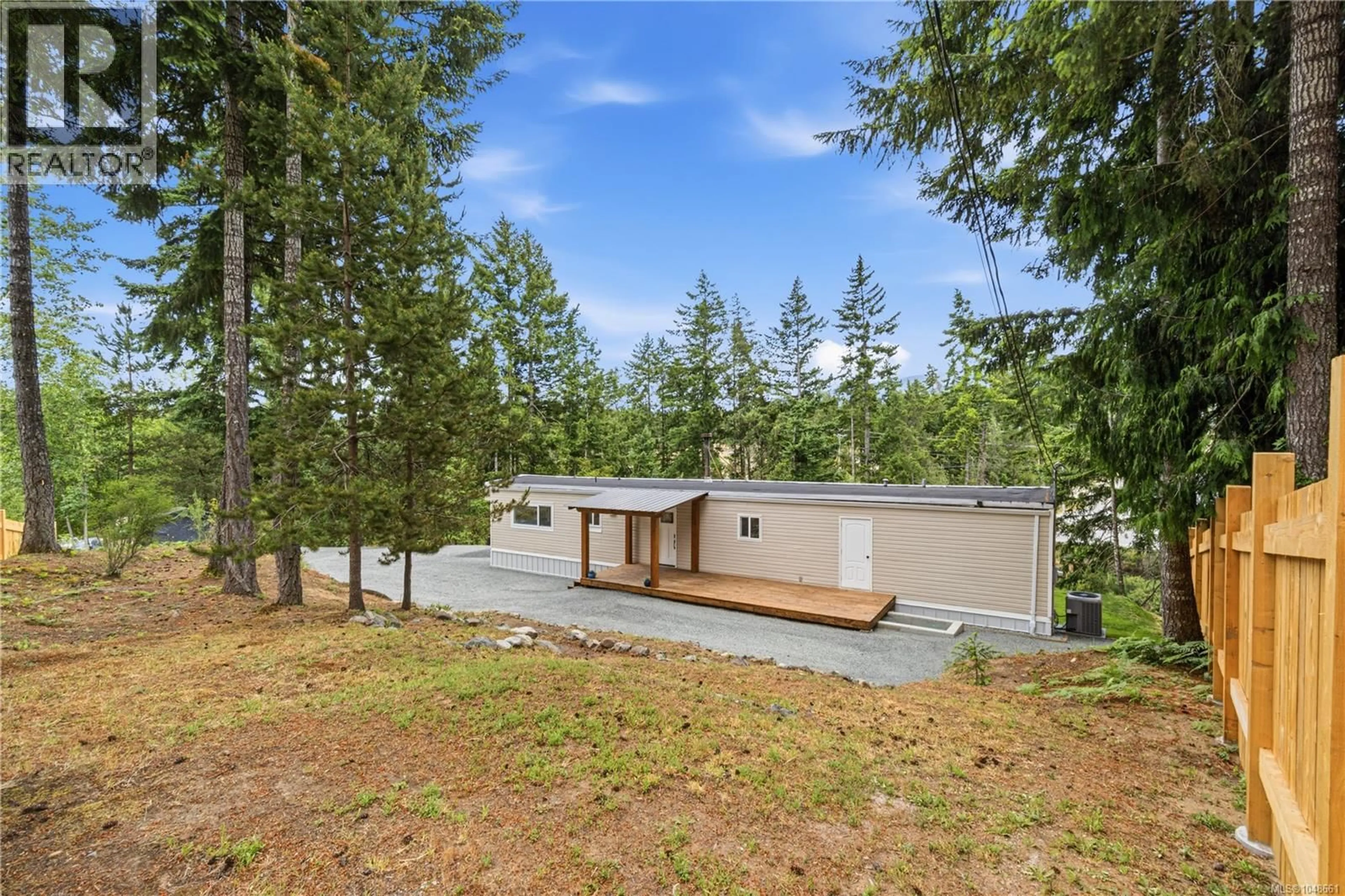 Home with vinyl exterior material, forest/trees view for 3840 MELROSE ROAD, Whiskey Creek British Columbia V9K2M9