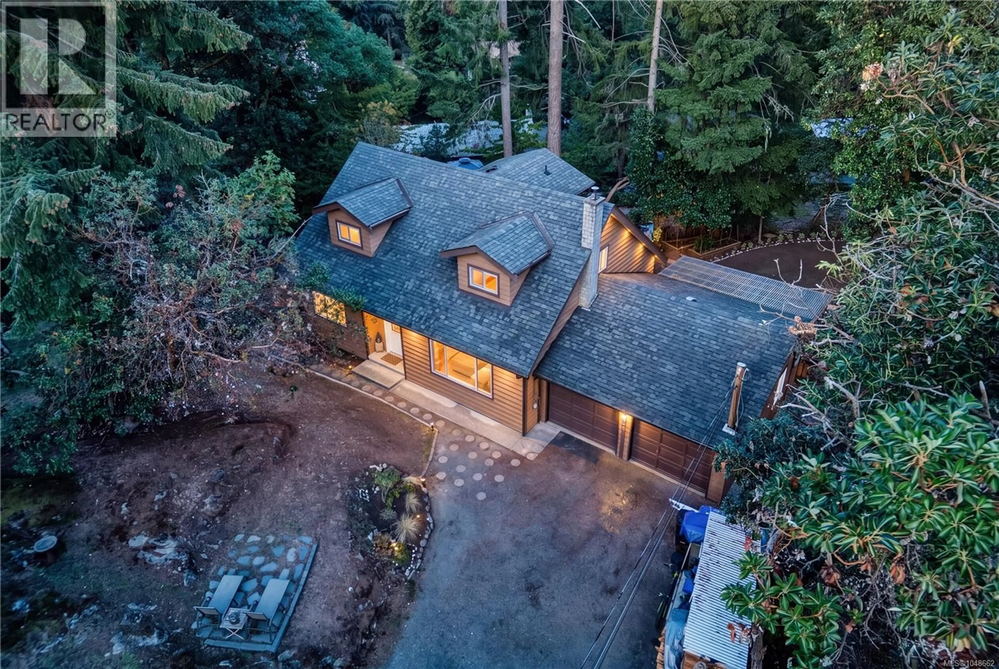 A pic from outside/outdoor area/front of a property/back of a property/a pic from drone, forest/trees view for 3380 HICKMAN PLACE, Nanaimo British Columbia V9T3Y1