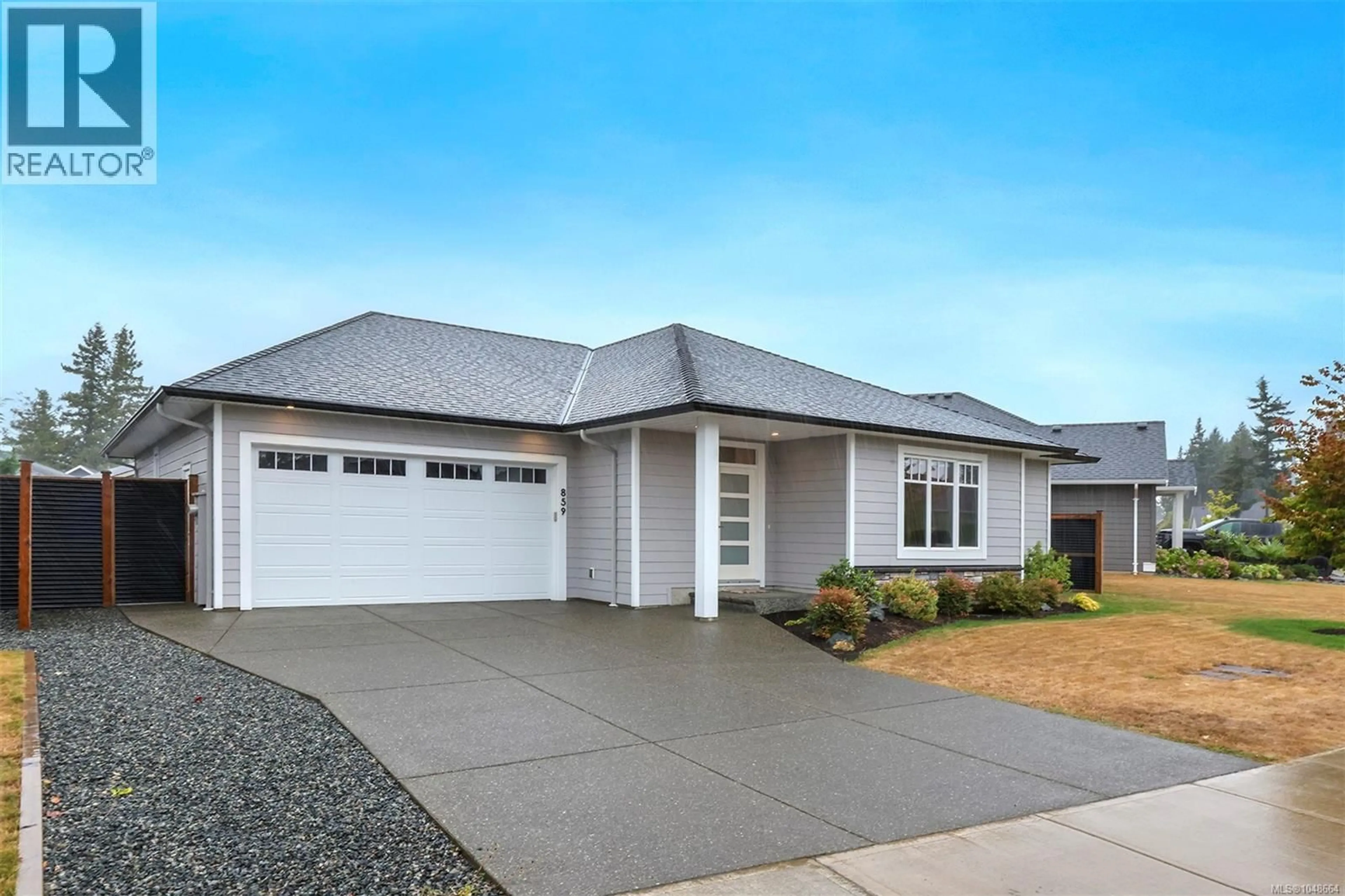 Home with vinyl exterior material, street for 859 LABRADOR DRIVE, Comox British Columbia V9M0C8
