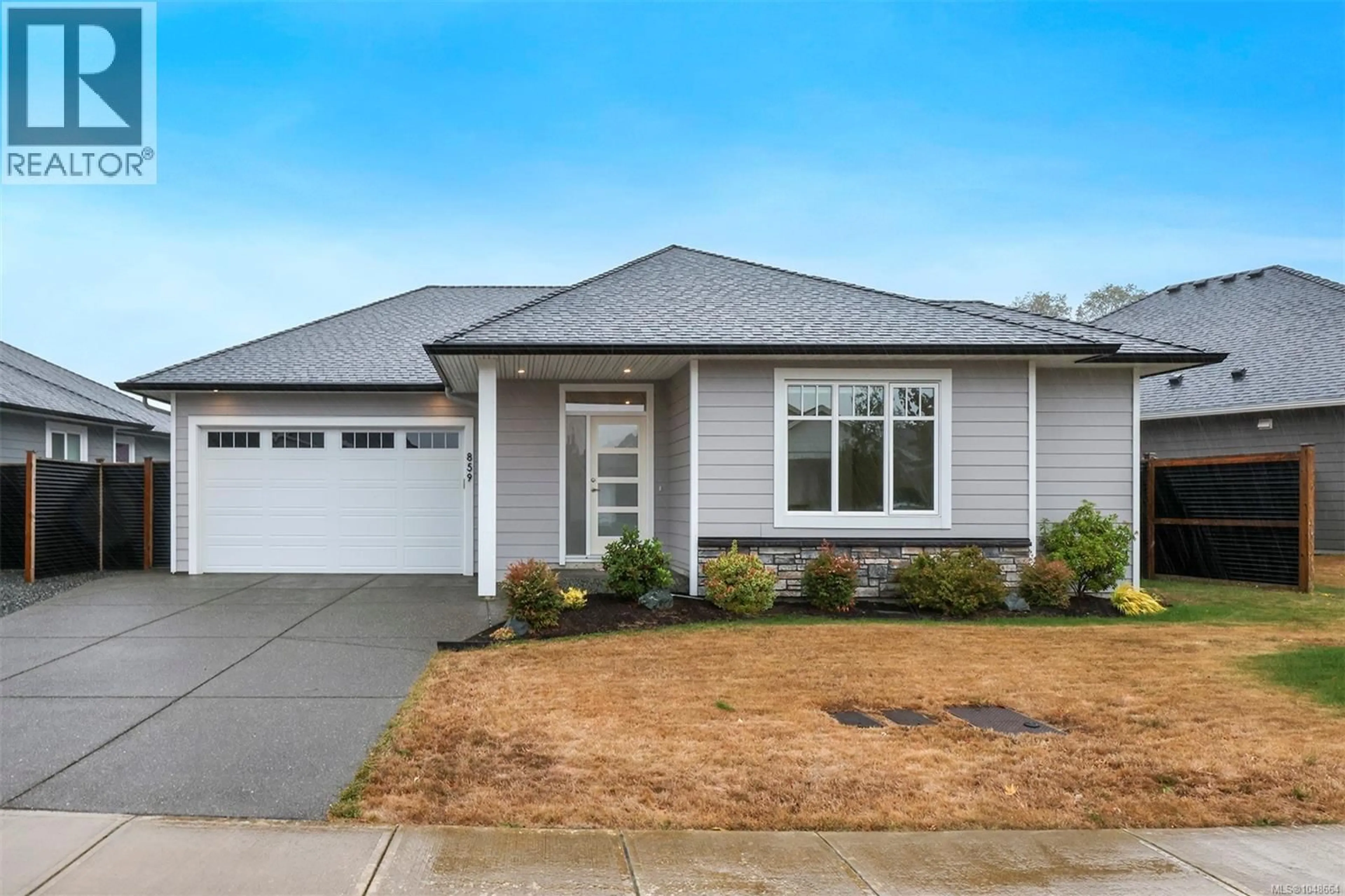 Home with vinyl exterior material, street for 859 LABRADOR DRIVE, Comox British Columbia V9M0C8