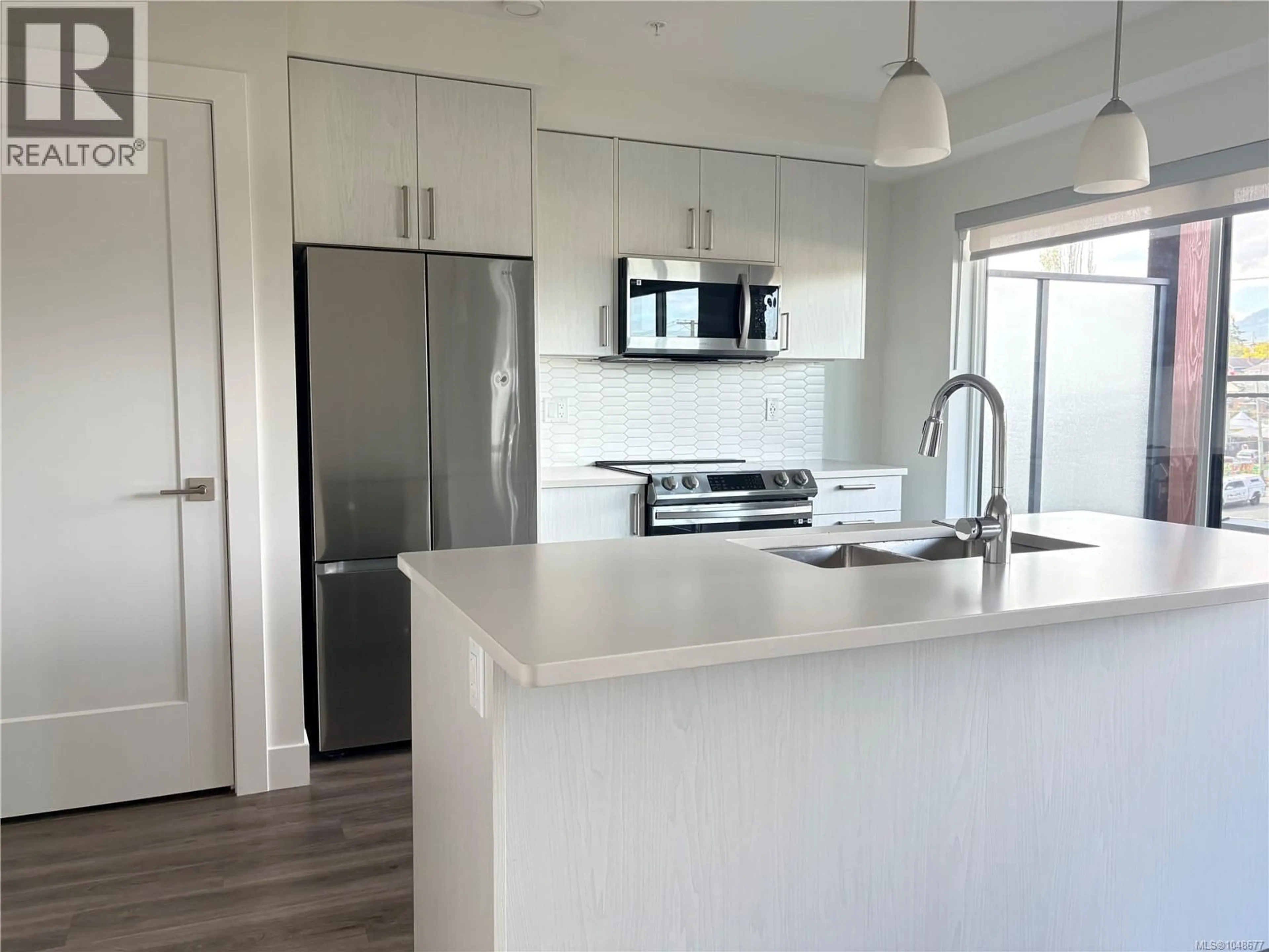 Open concept kitchen, unknown for 403 - 147 HALIBURTON STREET, Nanaimo British Columbia V9R4V9