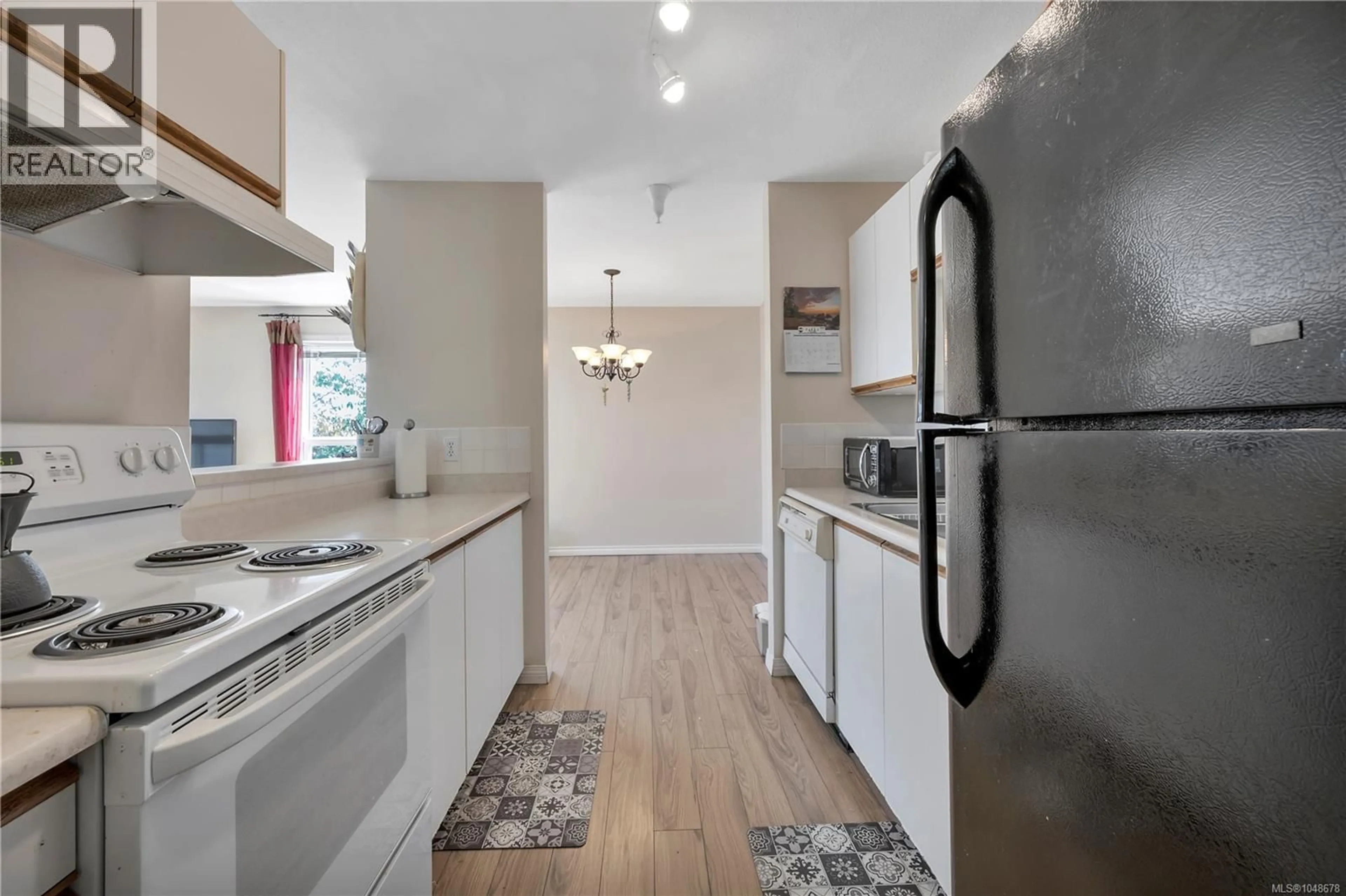 Open concept kitchen, unknown for 302 - 1631 DUFFERIN CRESCENT, Nanaimo British Columbia V9S5T4