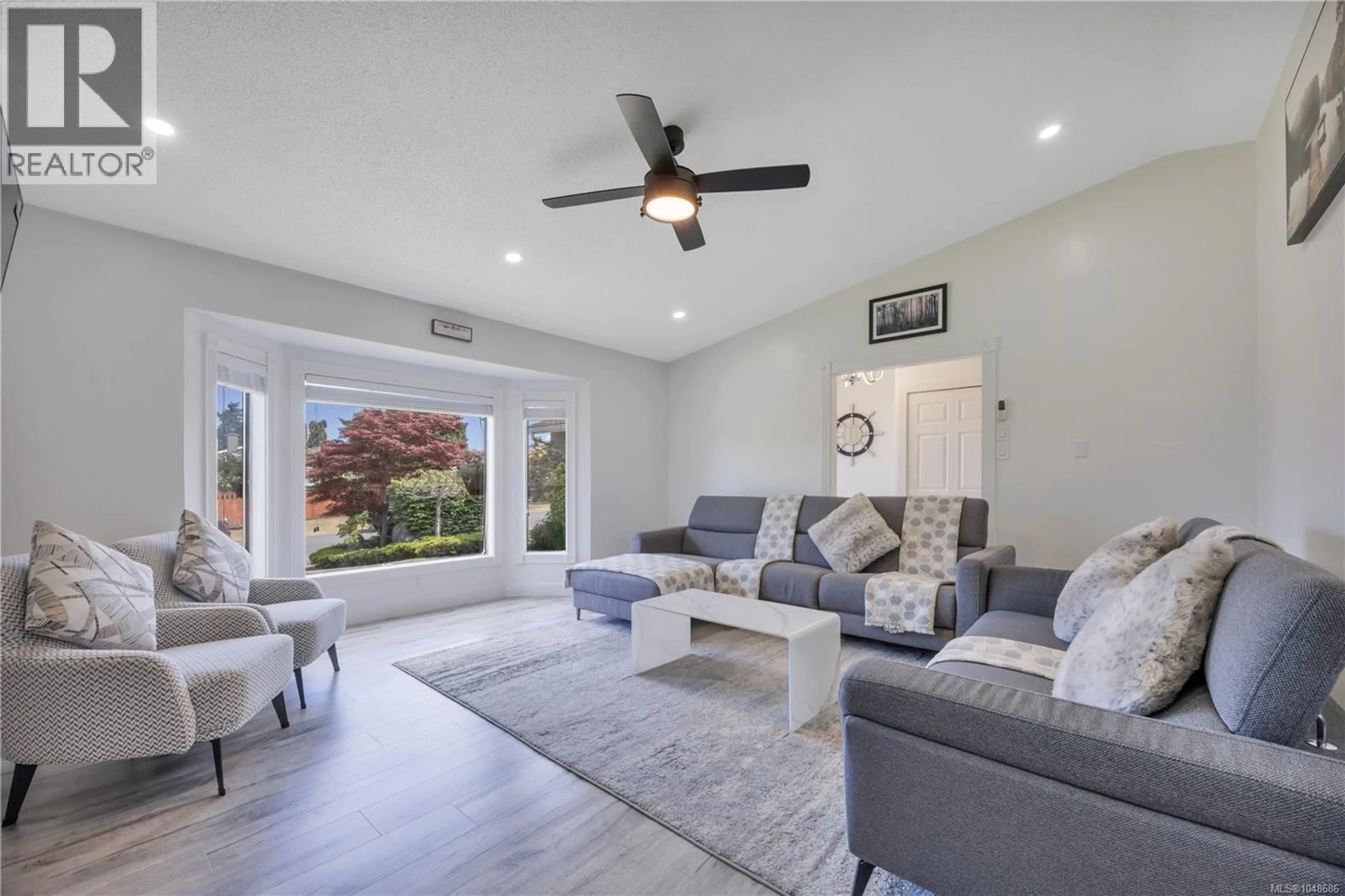Living room with furniture, unknown for 6279 BLUEBACK ROAD, Nanaimo British Columbia V9V1A9