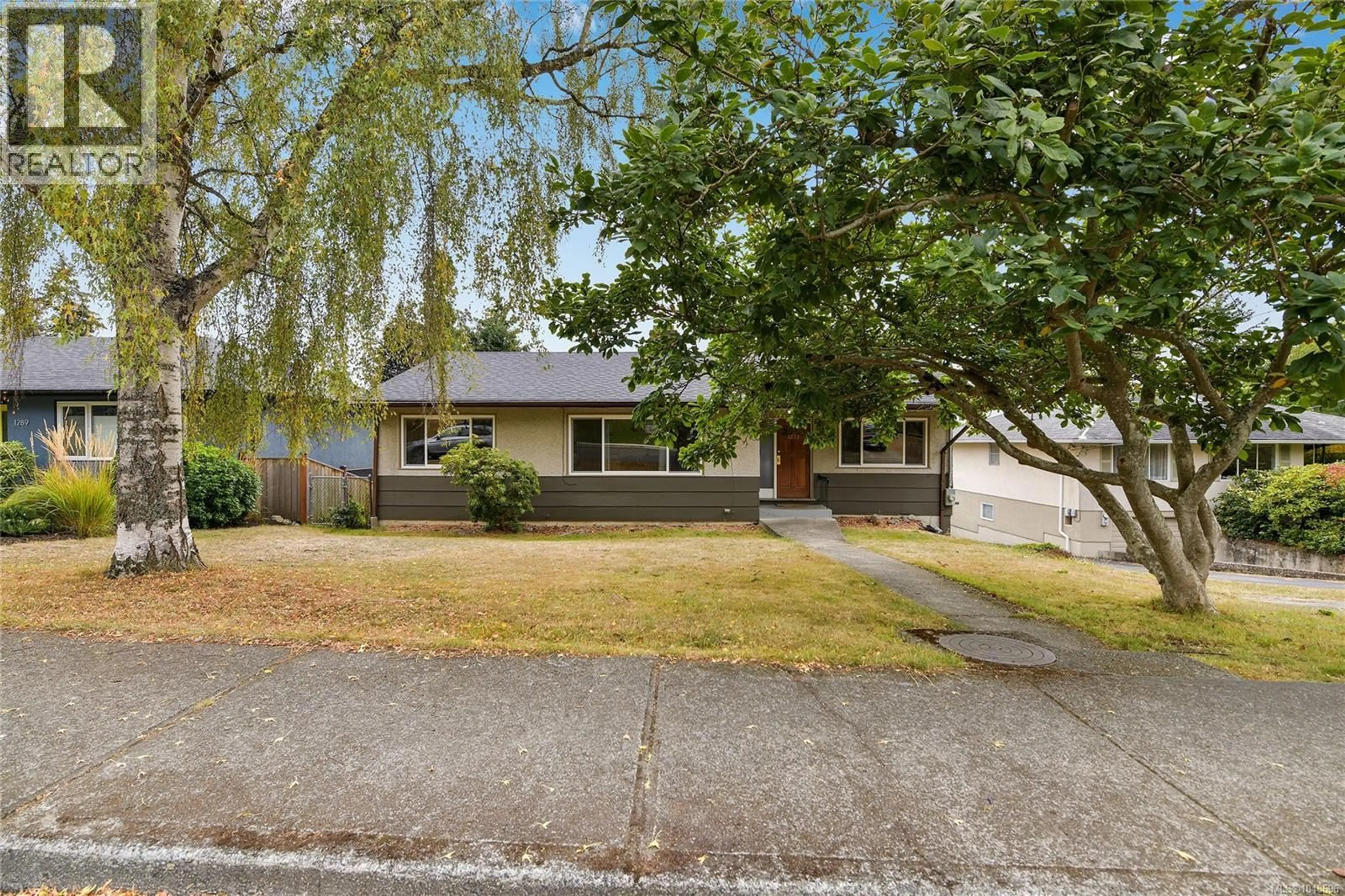 Home with vinyl exterior material, street for 1277 REVERCOMB PLACE, Victoria British Columbia V8V3G5