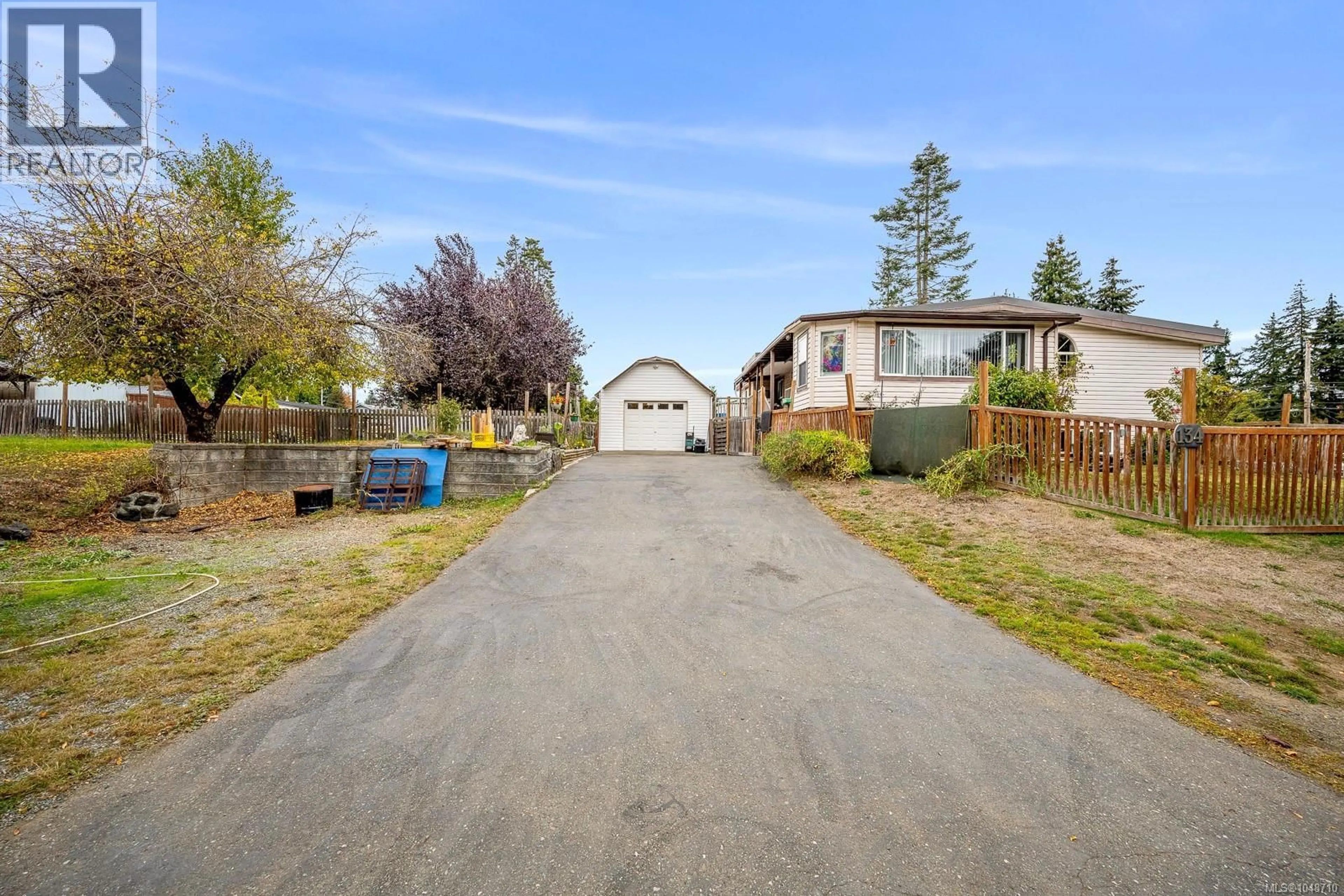 A pic from outside/outdoor area/front of a property/back of a property/a pic from drone, street for 134 SURFSIDE DRIVE, Campbell River British Columbia V9H1H6